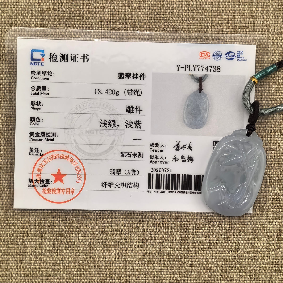 NGTC certified natural Grade-A pale lavender bamboo jadeite pendant shown with its matching certificate.