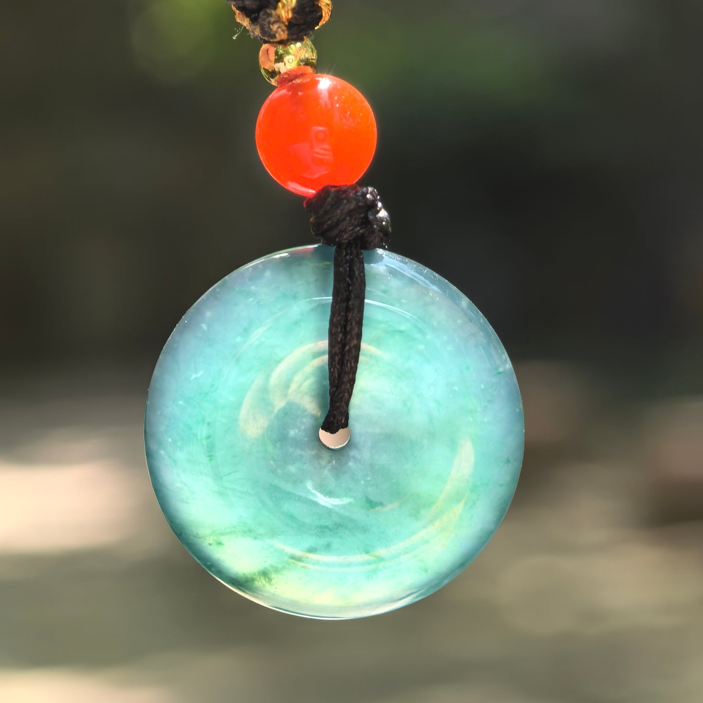 Natural Grade-A Icy Glutinous Teal Blue Peace Pendant · Guatemalan Jadeite