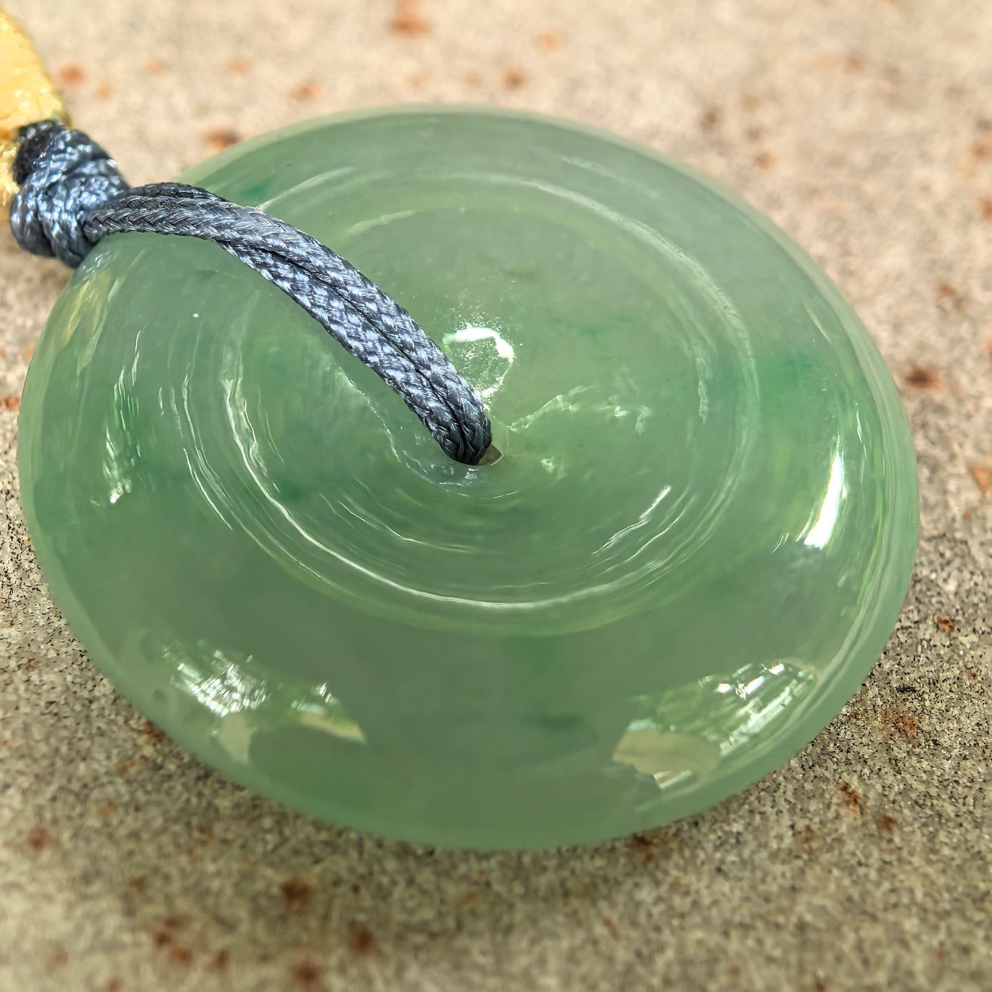 Natural Grade-A Glutinous Icy Green Peace Pendant · Burmese Jade