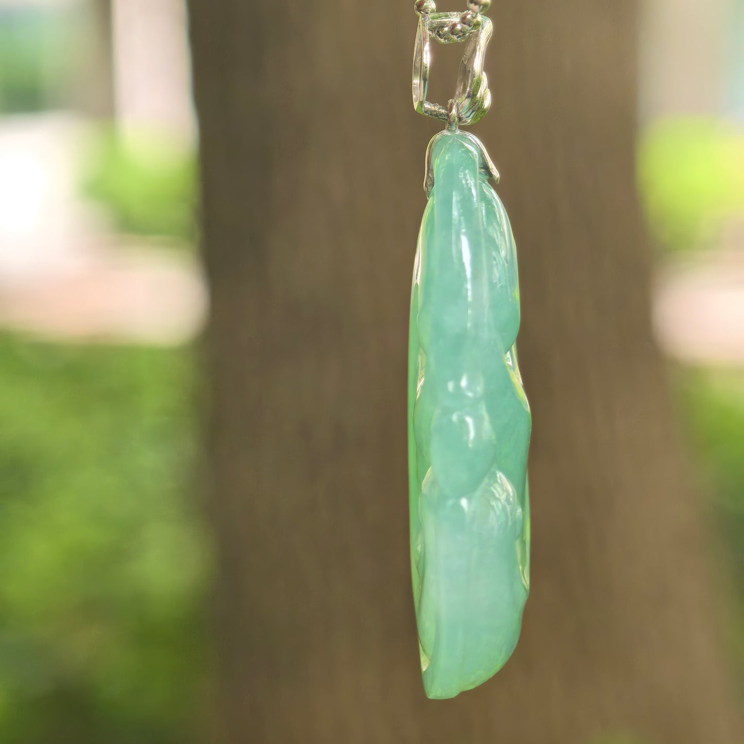 Natural Grade-A Icy Glutinous Apple Green Ruyi Jadeite Pendant · Burmese Jade