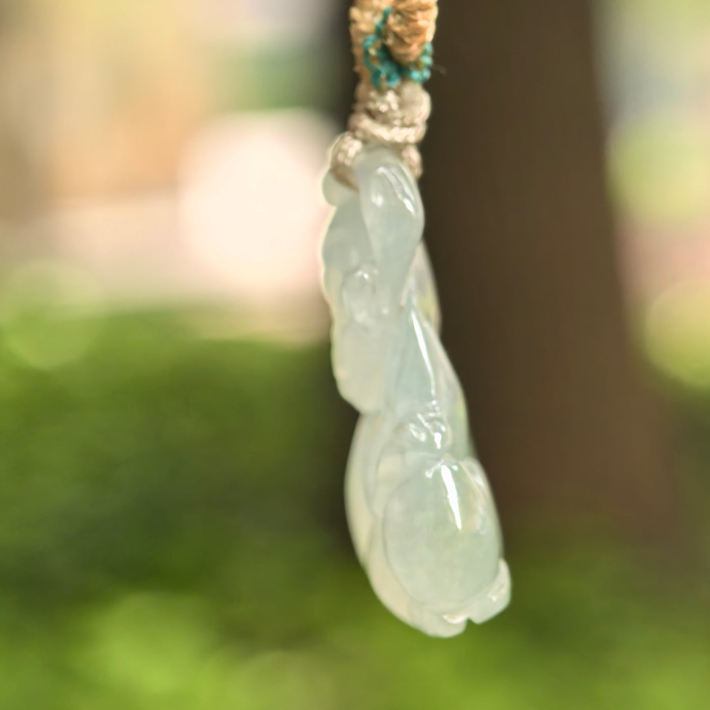 Natural Grade-A Icy Glutinous Light Green Base Monkey Jadeite Pendant · Burmese Jade
