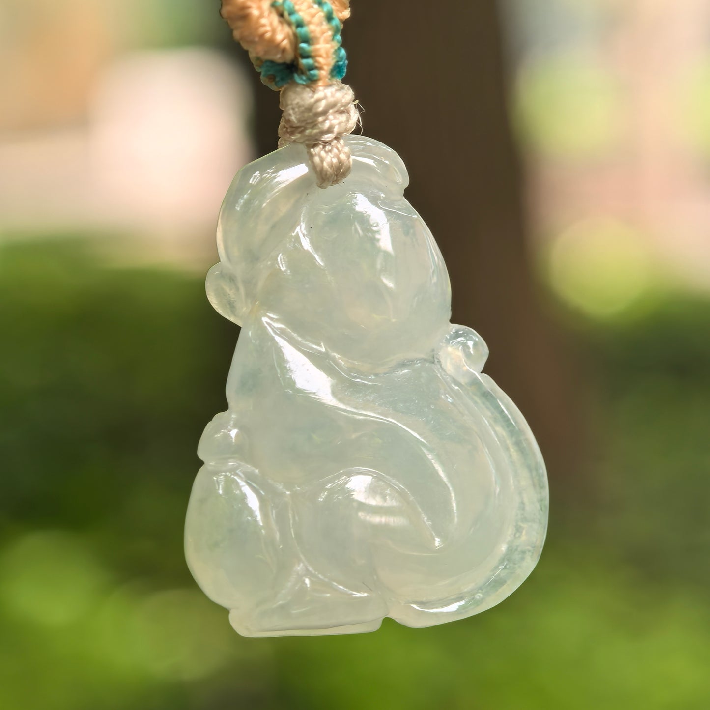 Natural Grade-A Icy Glutinous Light Green Base Monkey Jadeite Pendant · Burmese Jade