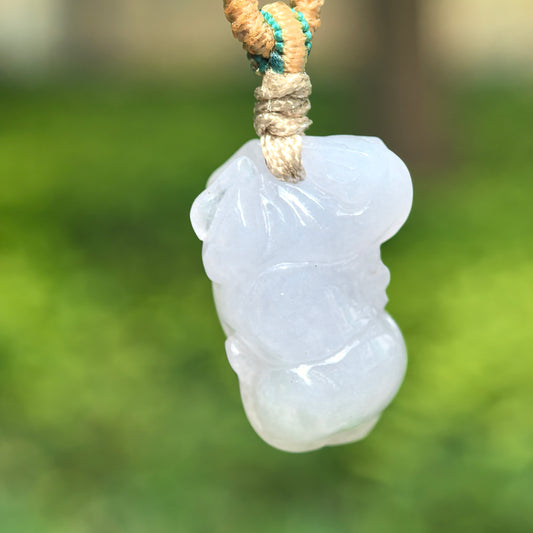 Natural Grade-A fine glutinous white-lavender Tang Horse jadeite pendant hanging on cord.

