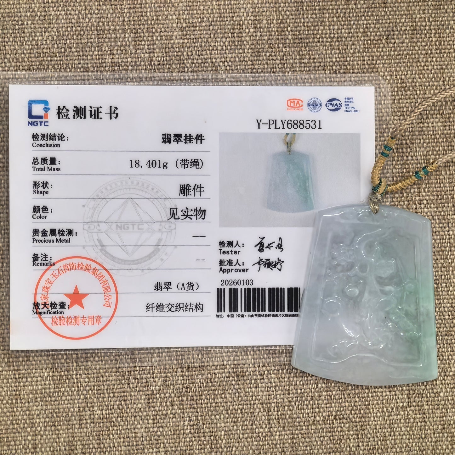 NGTC certified glutinous white-green floral jadeite pendant shown with matching certificate.
