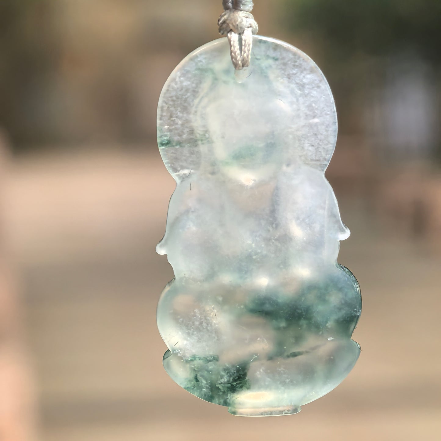 Natural Grade-A Icy Glutinous Green Floating Flower Guanyin Jadeite Pendant · Burmese Jade