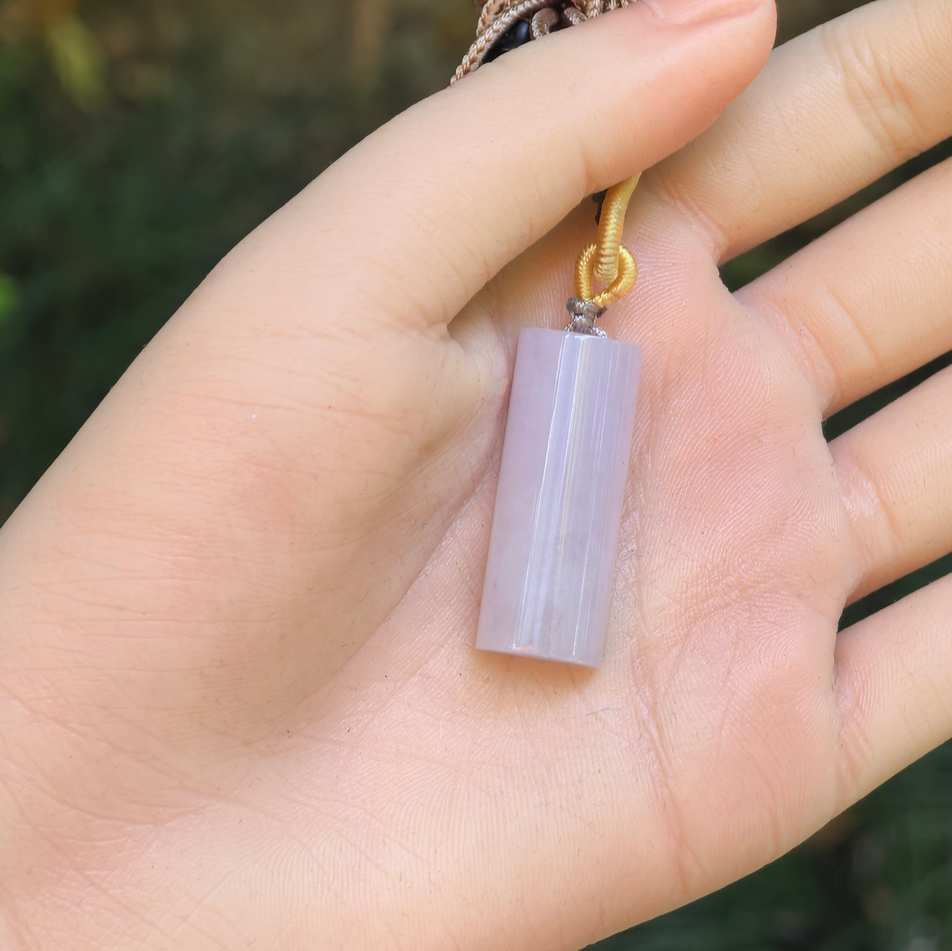 Natural Grade-A lavender jadeite pillar pendant with soft translucency and minimalist design.