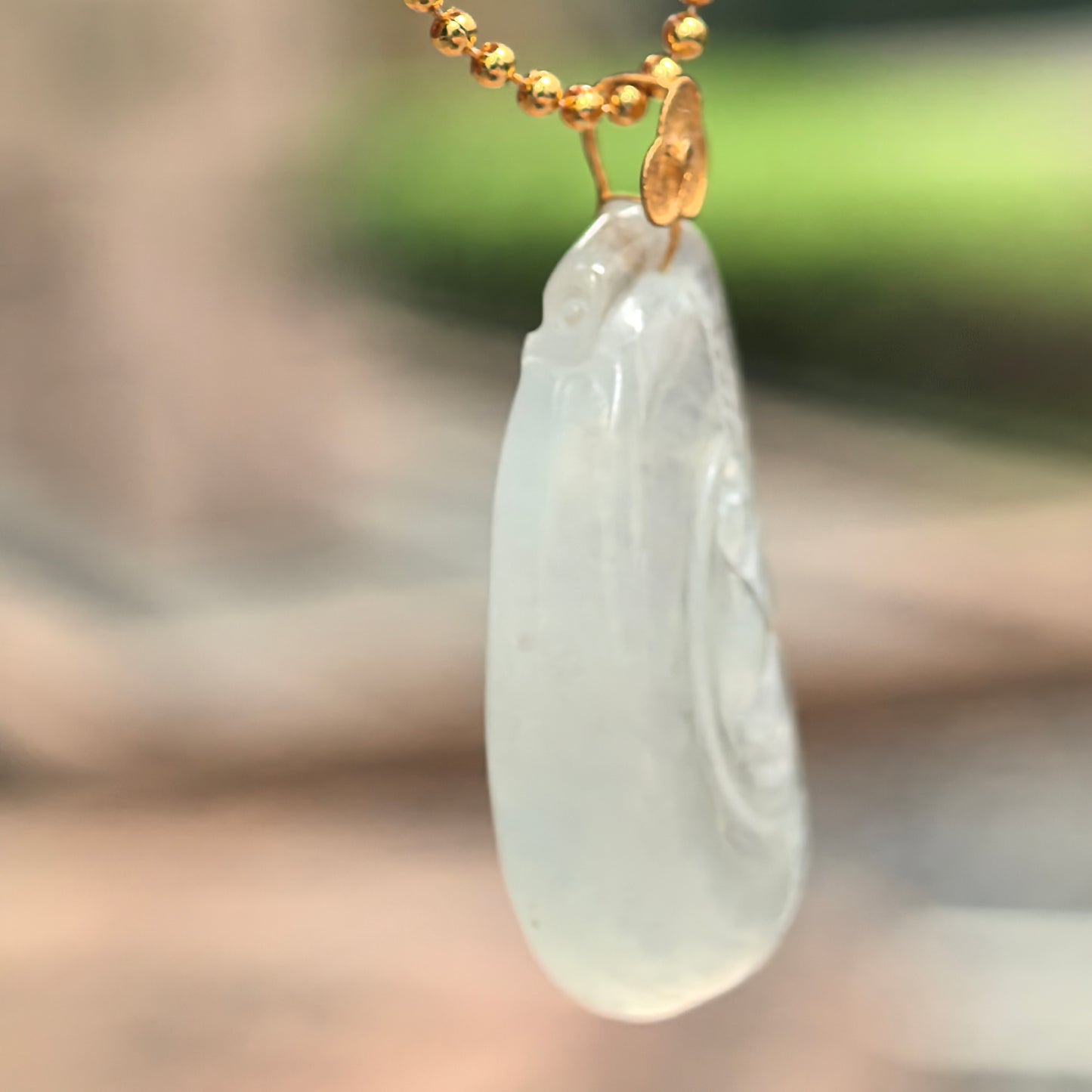 Natural Grade-A Glutinous Icy White Ruyi Jadeite Pendant · Burmese Jade