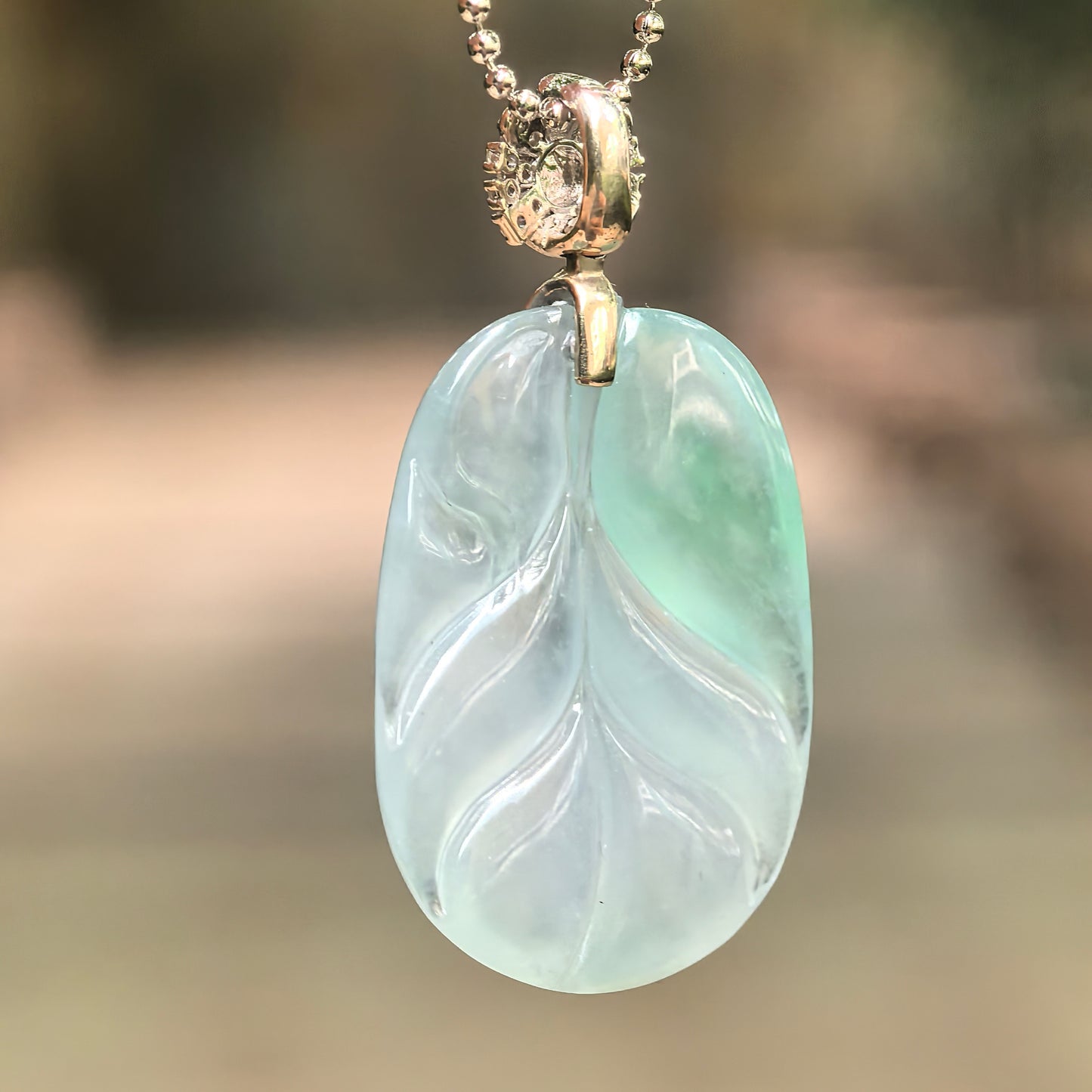 Natural Grade-A Icy Glutinous Light Green Jadeite Leaf Pendant · Burmese Jade