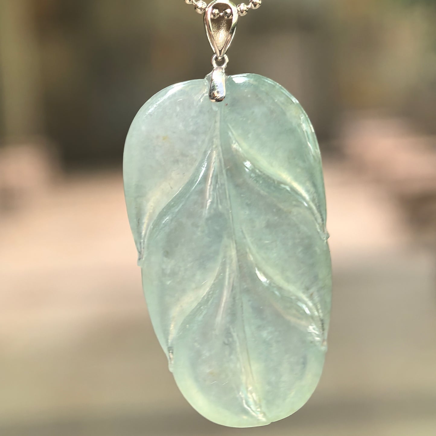 Natural Grade-A Icy Glutinous Light Green Jadeite Leaf Pendant · Burmese Jade
