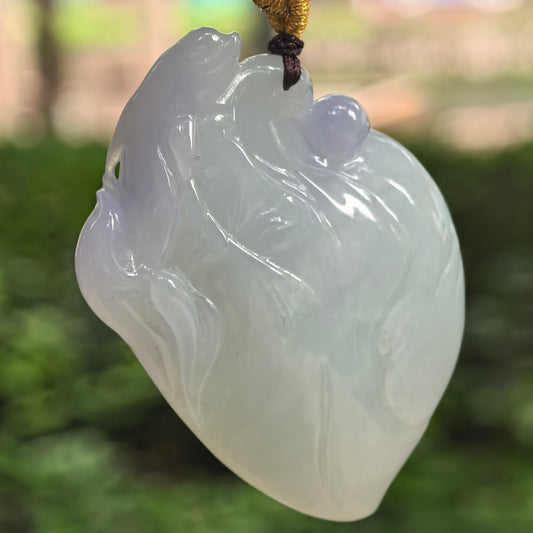 Natural Grade-A glutinous light purple jadeite dolphin pendant with flowing wave carving hanging on cord.