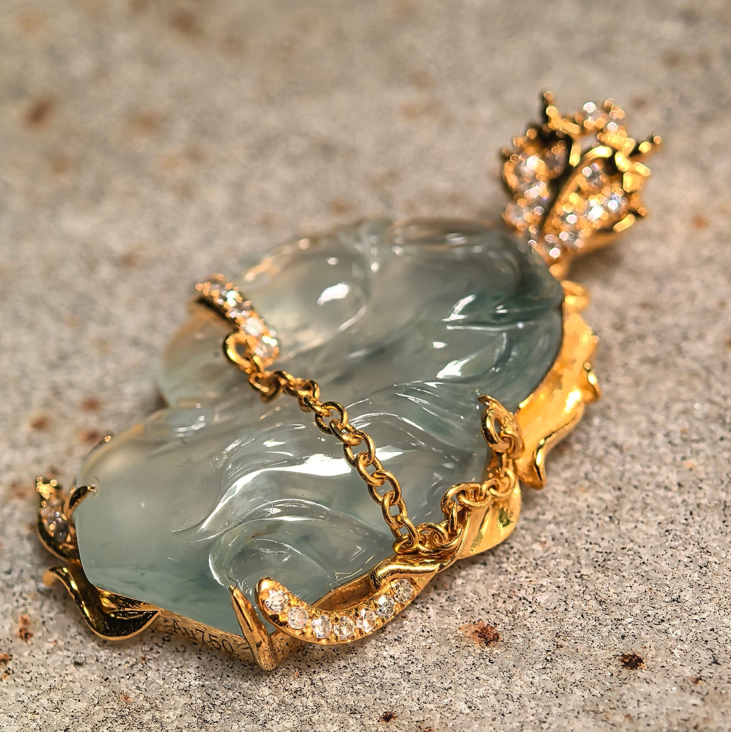 18K gold mounted horse head jadeite pendant photographed at different angle showing carving depth and structure.
