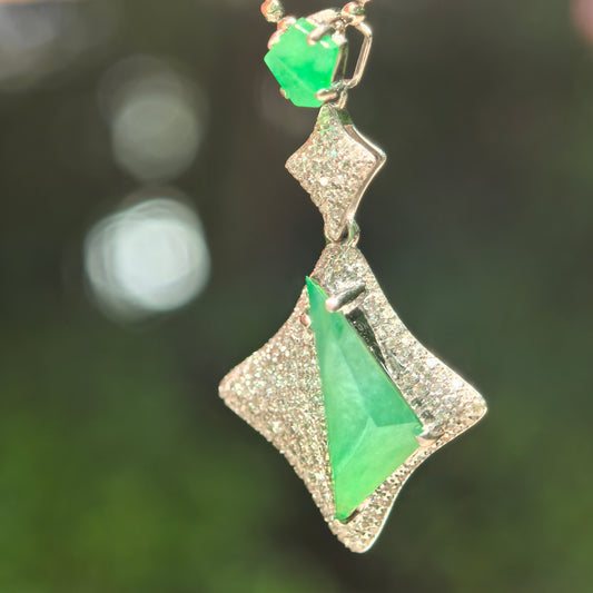 Natural Grade-A icy green jadeite rhombus pendant with 18K gold and diamond accents.
