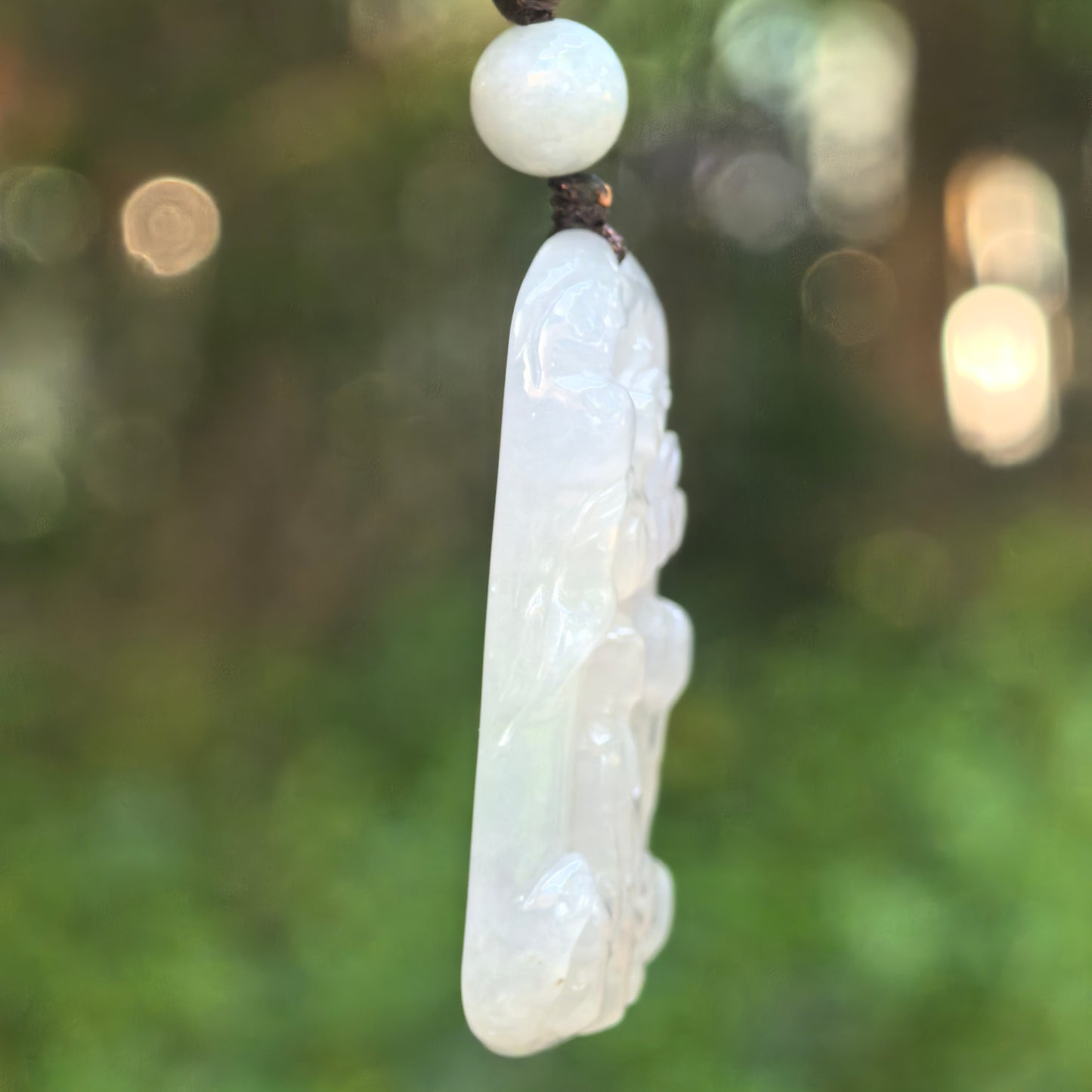 Natural Grade-A Icy Glutinous White Abstract Guanyin Jadeite Pendant · Burmese Jade
