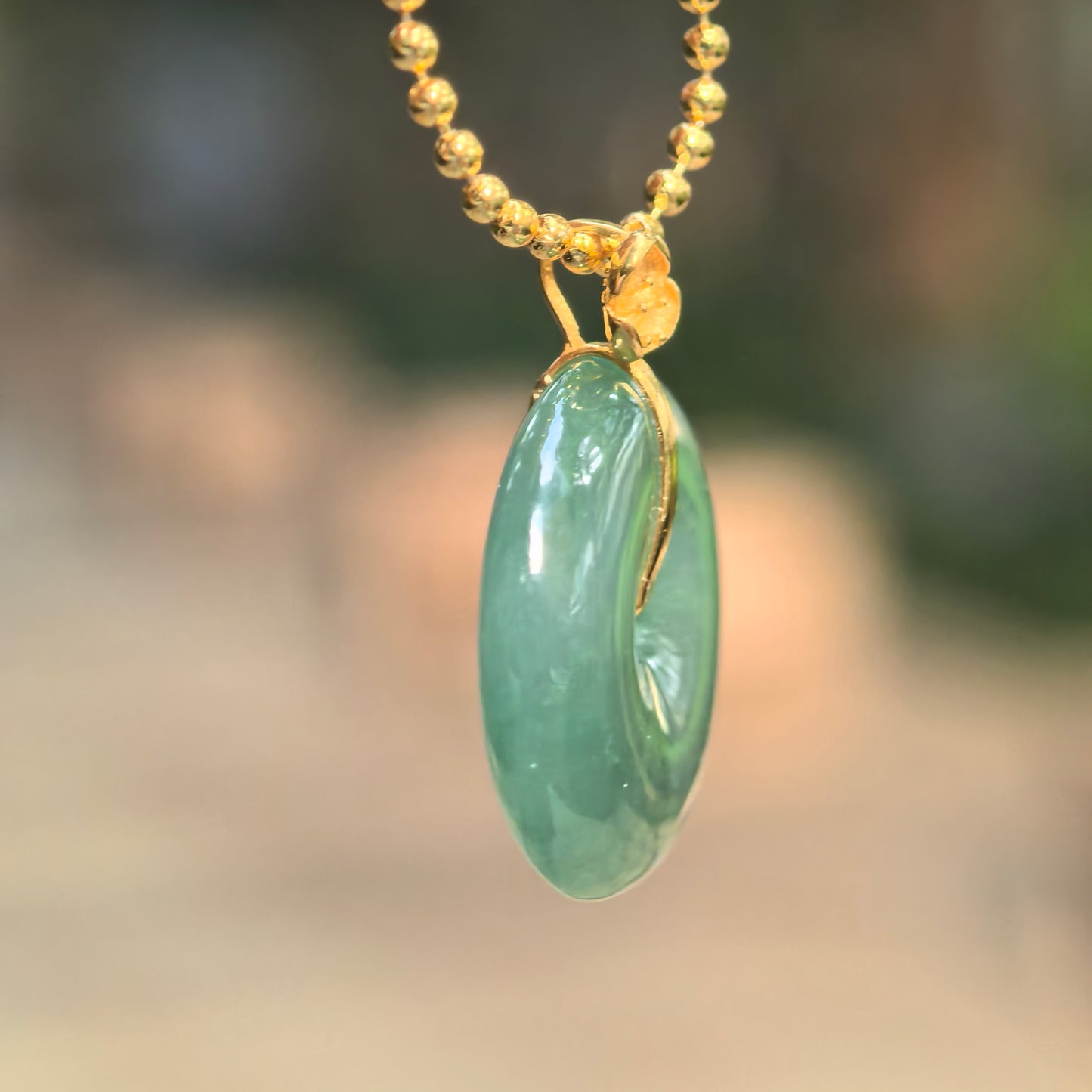 Natural Grade-A Icy Glutinous Green Jadeite Peace Pendant · Burmese Jade