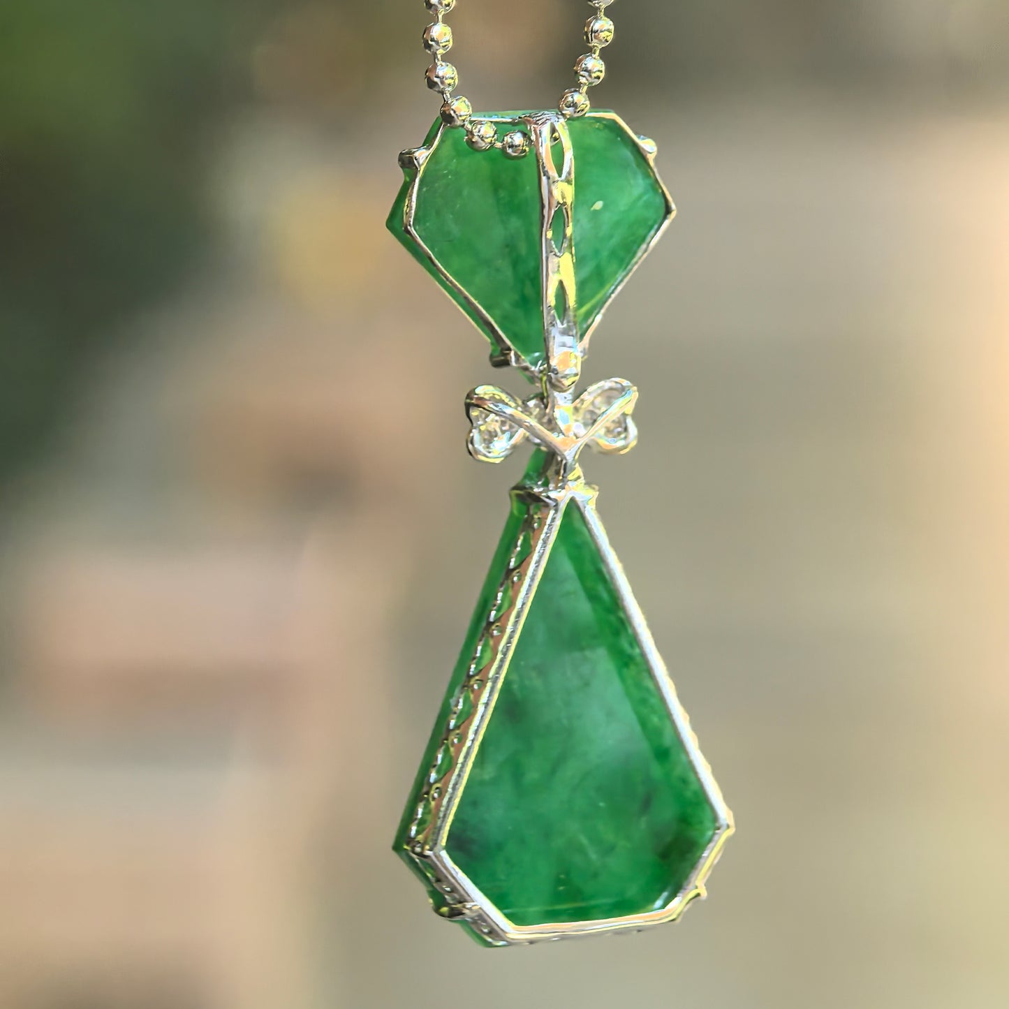 Natural Grade-A Icy Glutinous Green Bow-Tie Jadeite Pendant · Burmese Jade