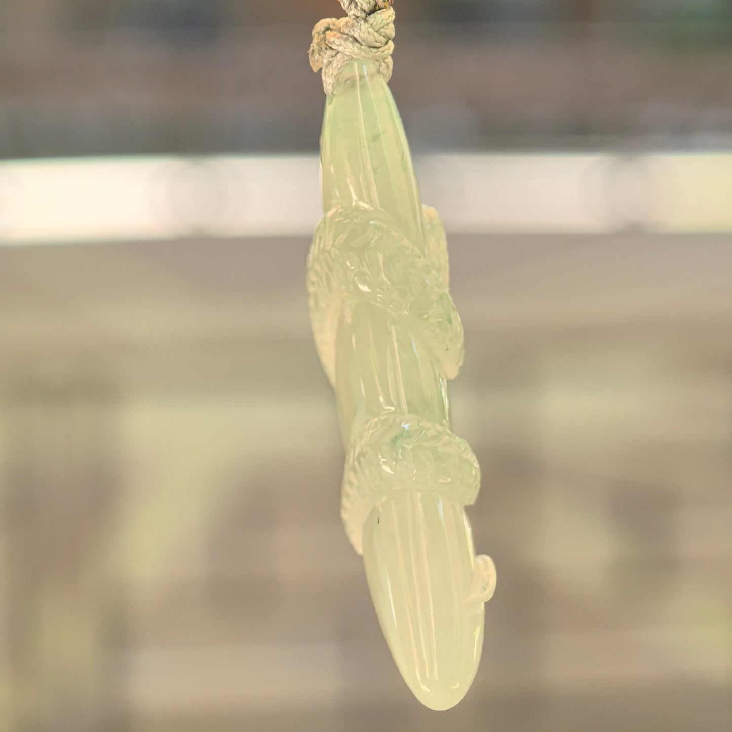 Natural Grade-A Icy Glutinous Light Green Snake Jadeite Pendant · Burmese Jade
