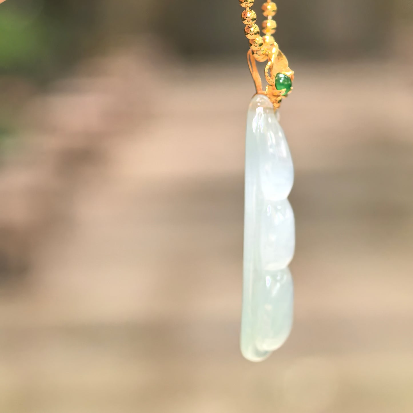 Natural Grade-A Icy Light Green Bean Pod Jadeite Pendant · Burmese Jade