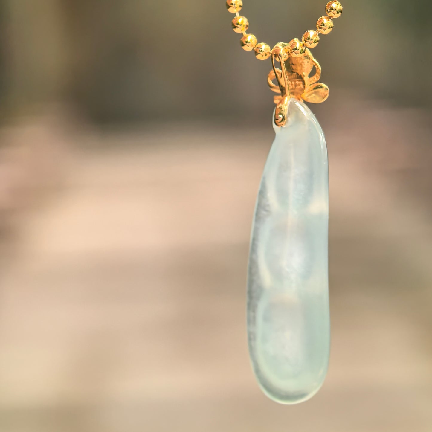 Natural Grade-A Icy Light Green Bean Pod Jadeite Pendant · Burmese Jade