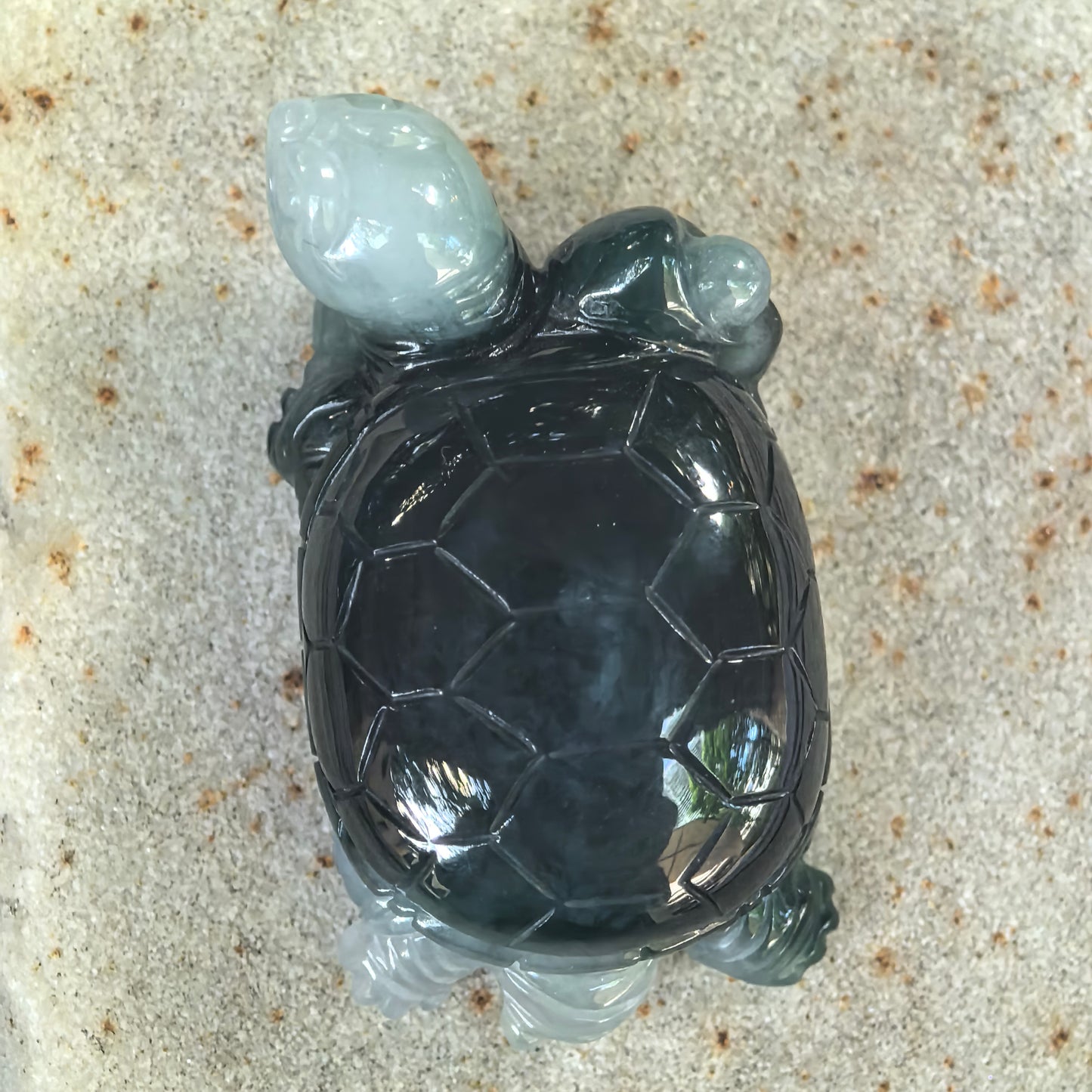 Top view of Natural Grade-A Burmese jadeite turtle ornament showing the polished dark green shell and carved geometric shell plates.