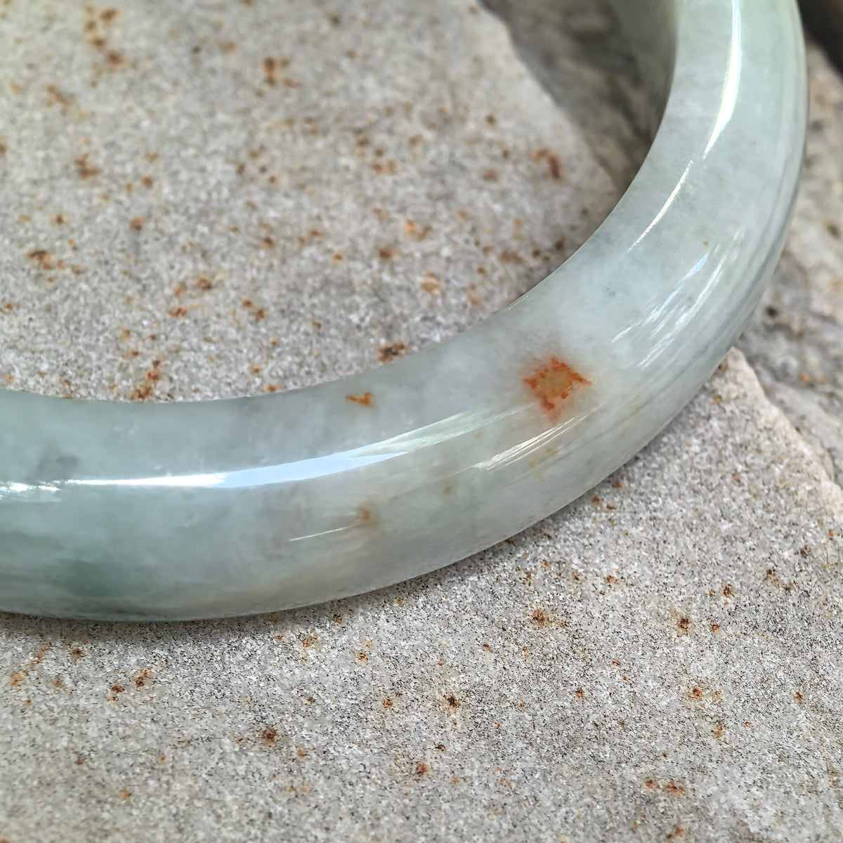 Glutinous Pale Green D-Shape Jadeite Bangle with Golden-Brown Flecks -60mm