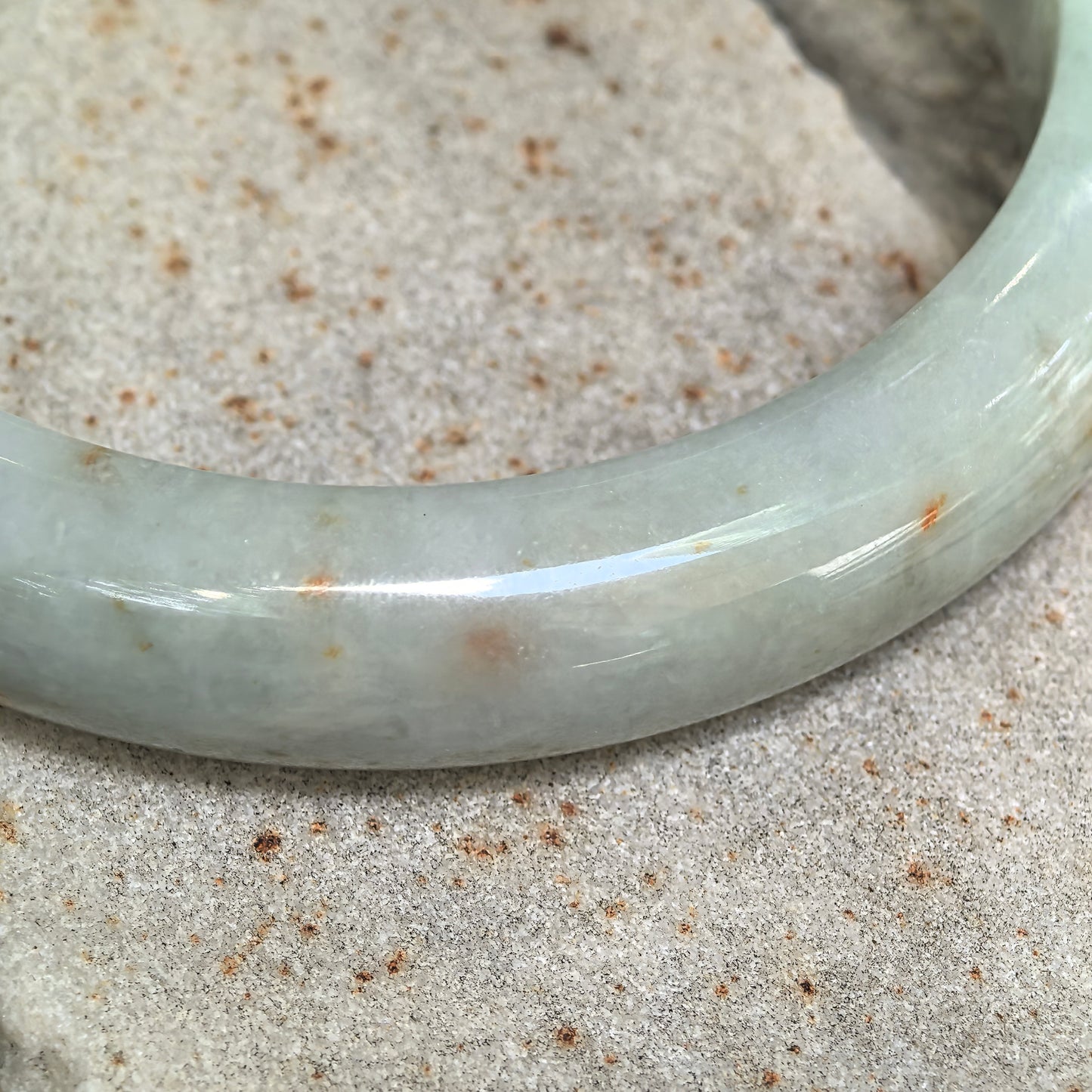 Glutinous Pale Green D-Shape Jadeite Bangle with Golden-Brown Flecks -60mm