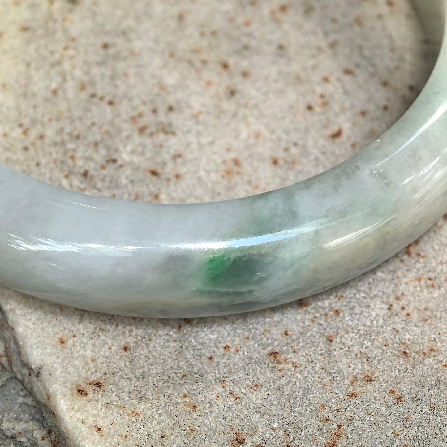 Glutinous Pale Green D-Shape Jadeite Bangle with Golden-Brown Flecks -60mm