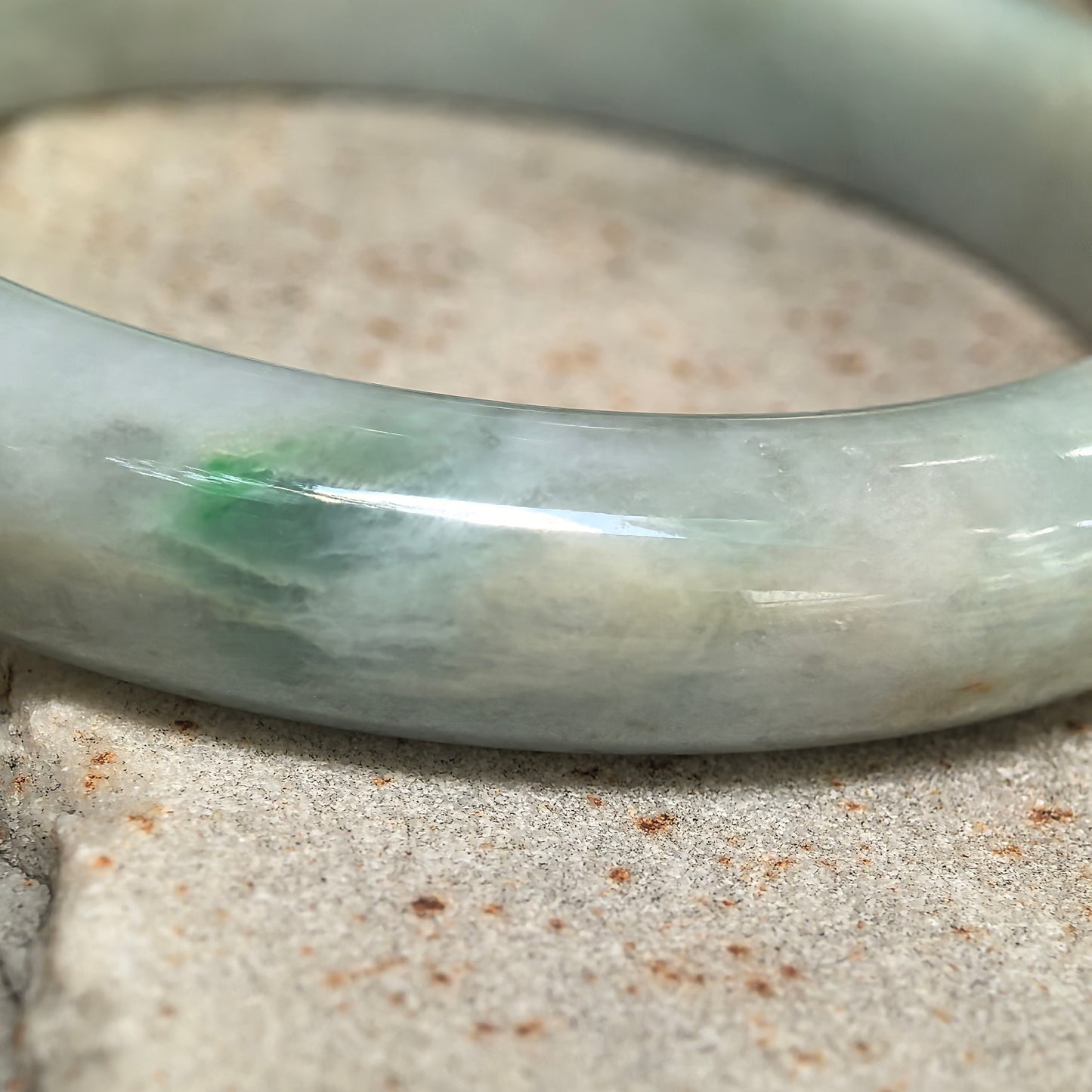 Glutinous Pale Green D-Shape Jadeite Bangle with Golden-Brown Flecks -60mm