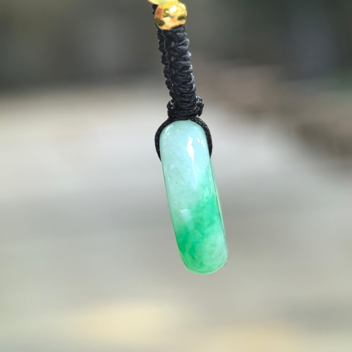 Fine Glutinous White and Green Jadeite Donut Pendant