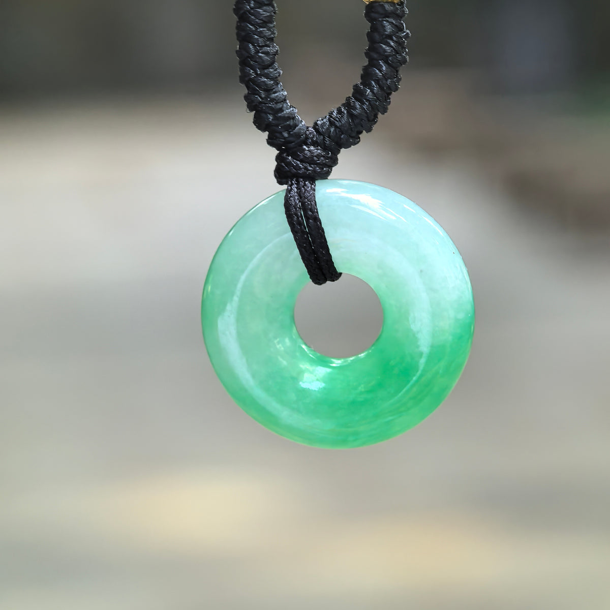 Fine Glutinous White and Green Jadeite Donut Pendant