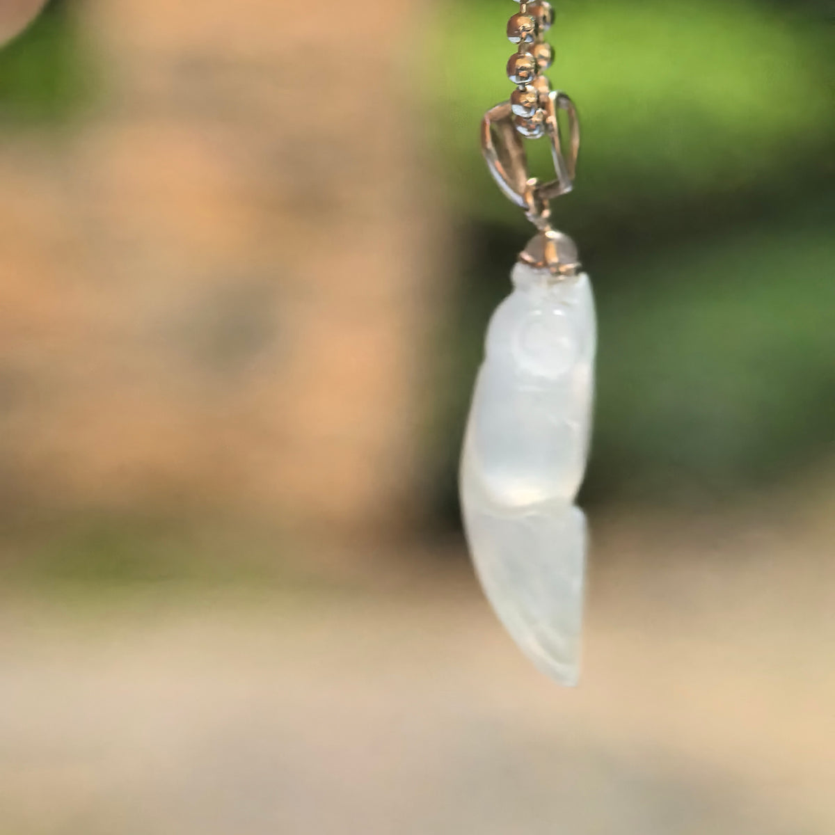 Icy Translucent White Goldfish Jadeite Pendant with 18K Gold Bail