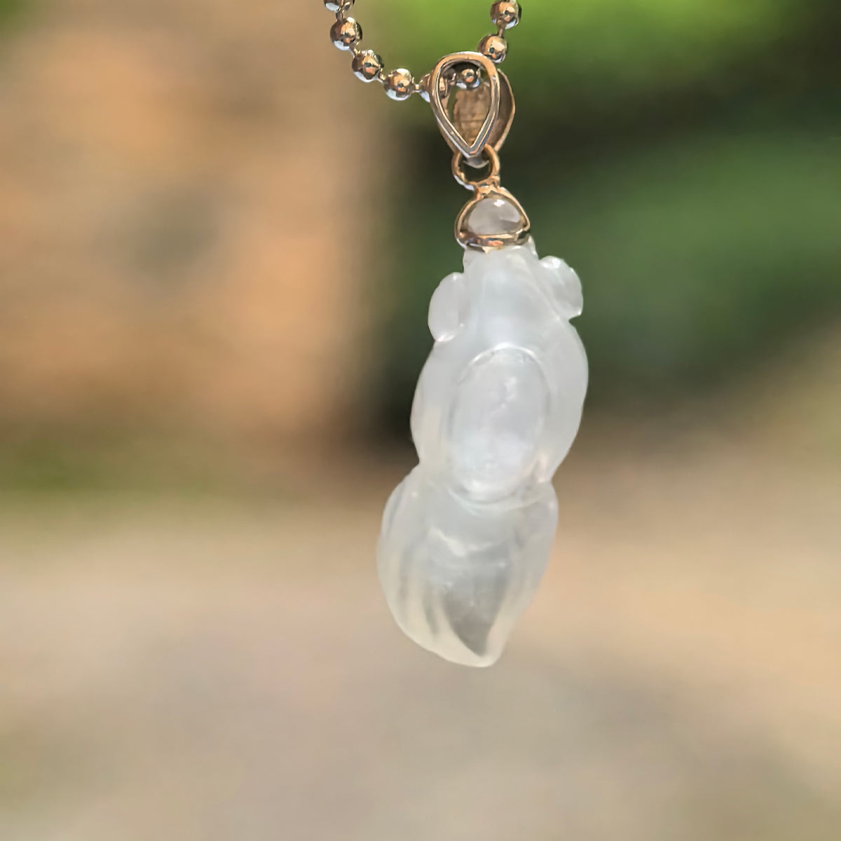 Icy Translucent White Goldfish Jadeite Pendant with 18K Gold Bail