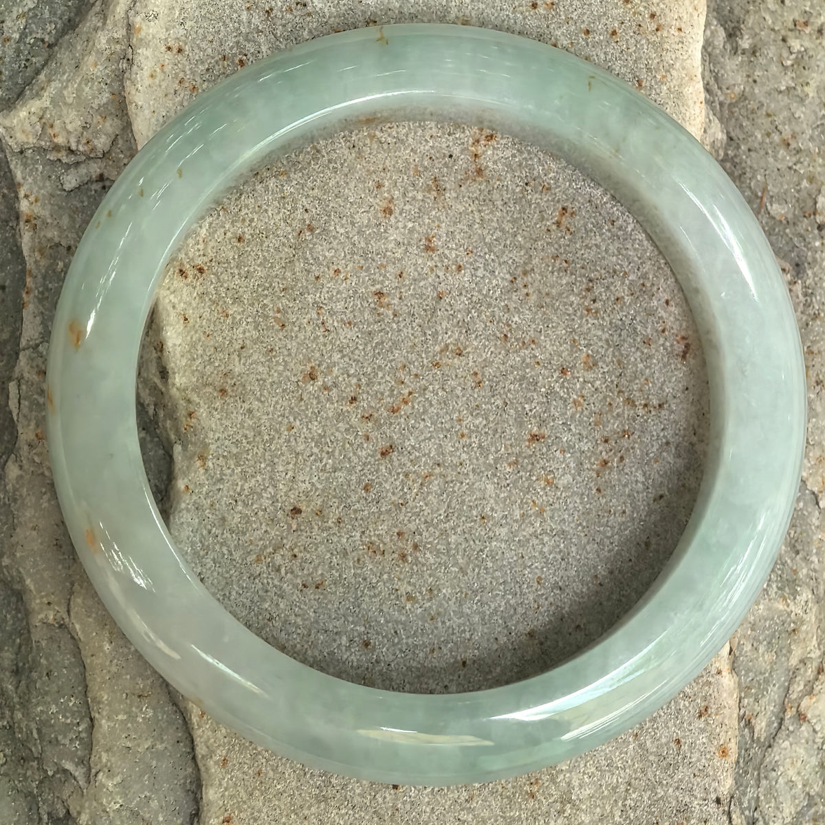 Glutinous Pale Apple Green D-Shape Jadeite Bangle with Golden-Brown Flecks -57mm