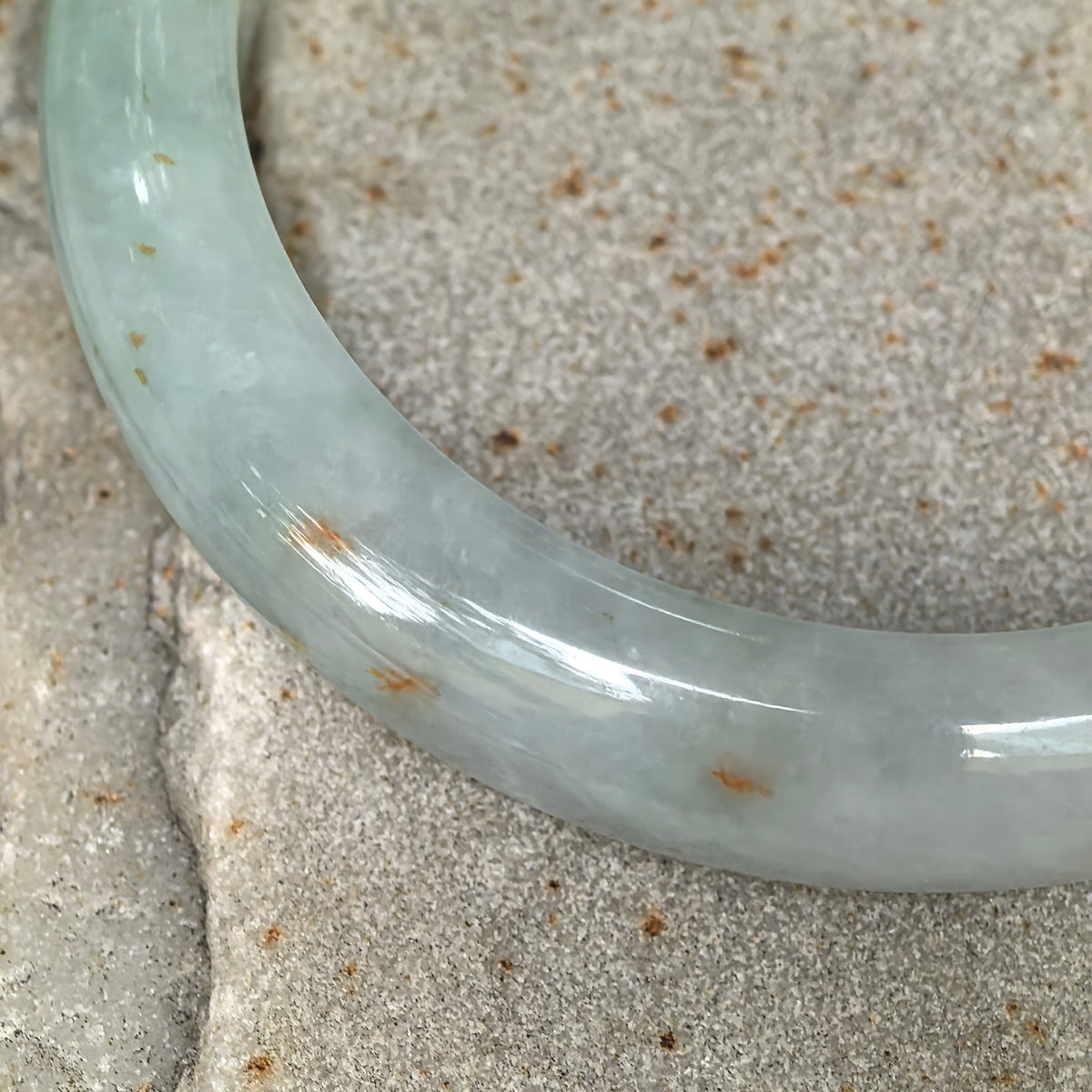 Glutinous Pale Apple Green D-Shape Jadeite Bangle with Golden-Brown Flecks -57mm