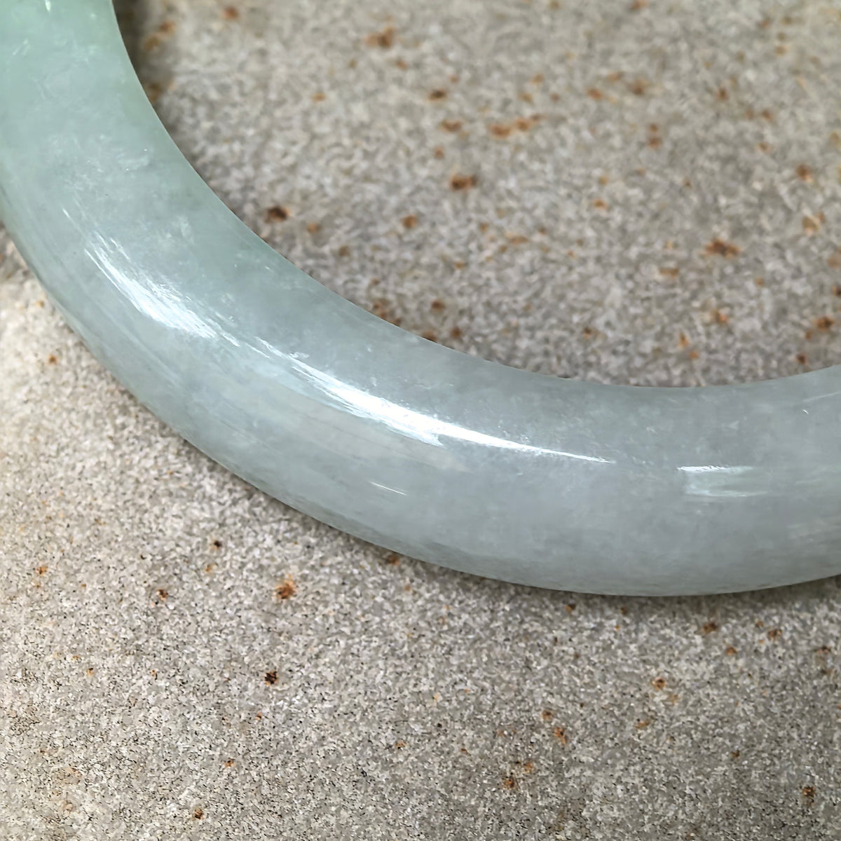 Glutinous Pale Apple Green D-Shape Jadeite Bangle with Golden-Brown Flecks -57mm