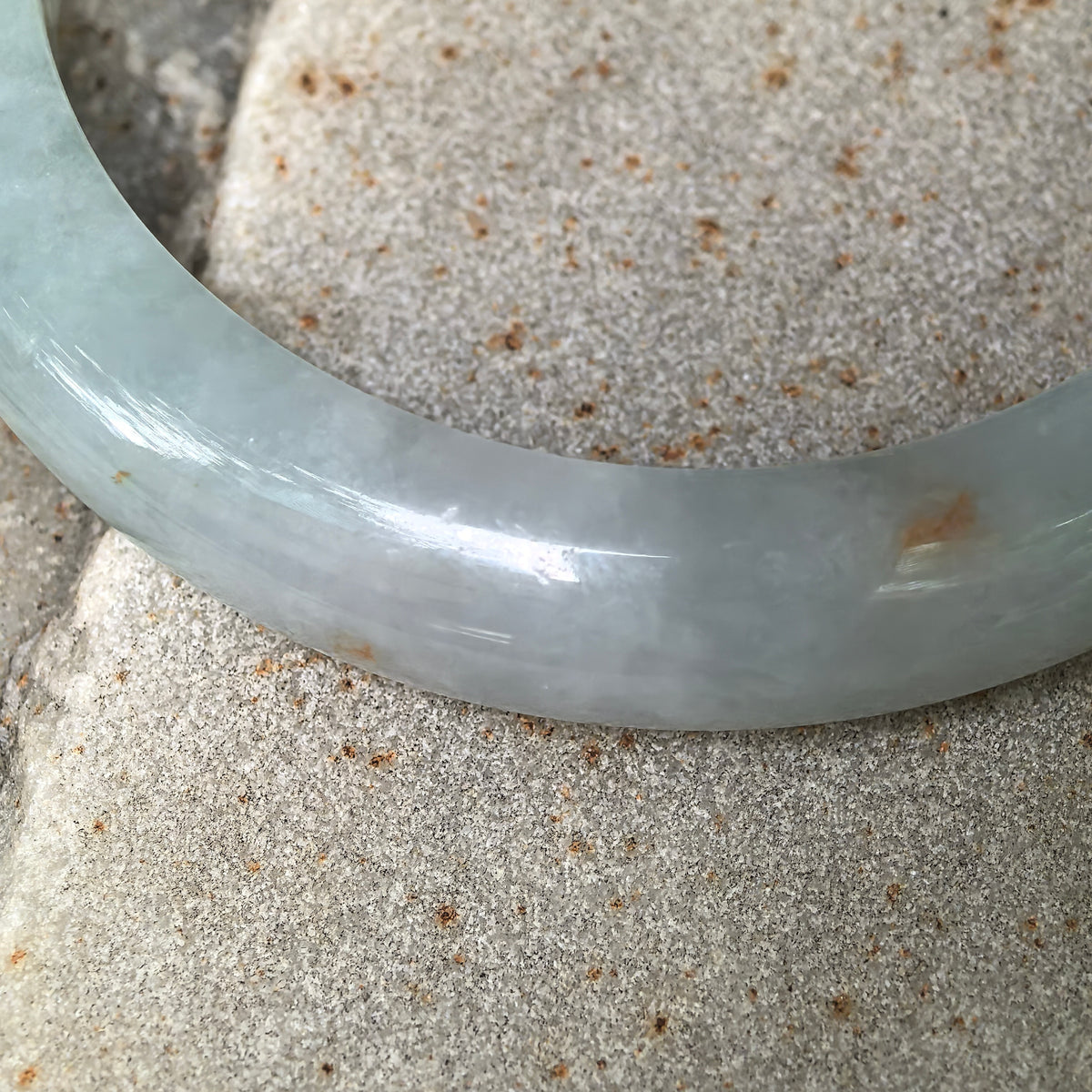 Glutinous Pale Apple Green D-Shape Jadeite Bangle with Golden-Brown Flecks -57mm
