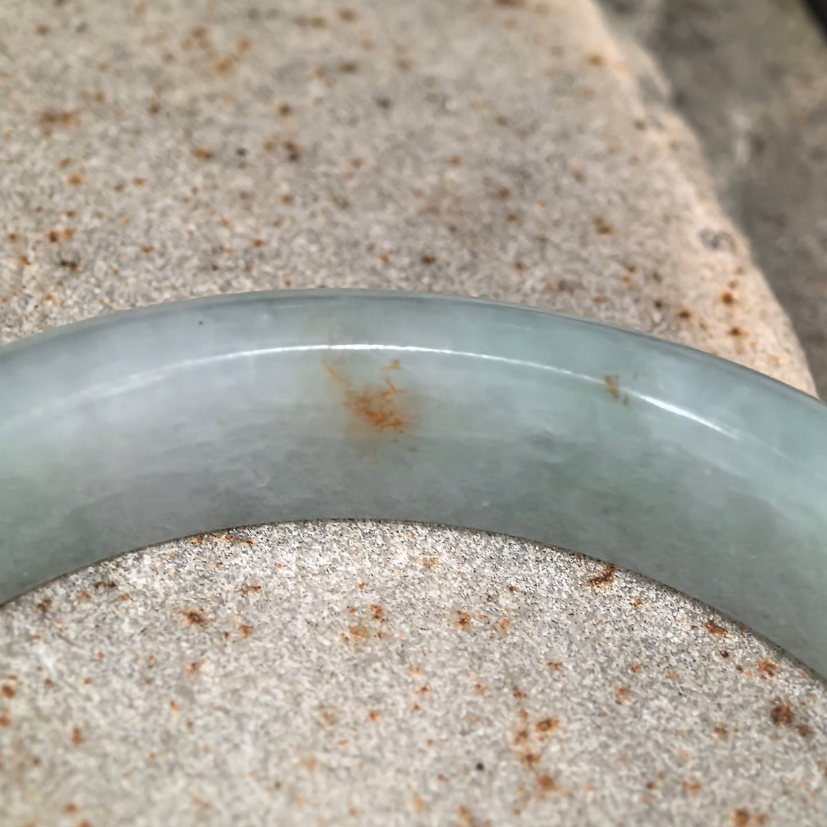 Glutinous Pale Apple Green D-Shape Jadeite Bangle with Golden-Brown Flecks -57mm
