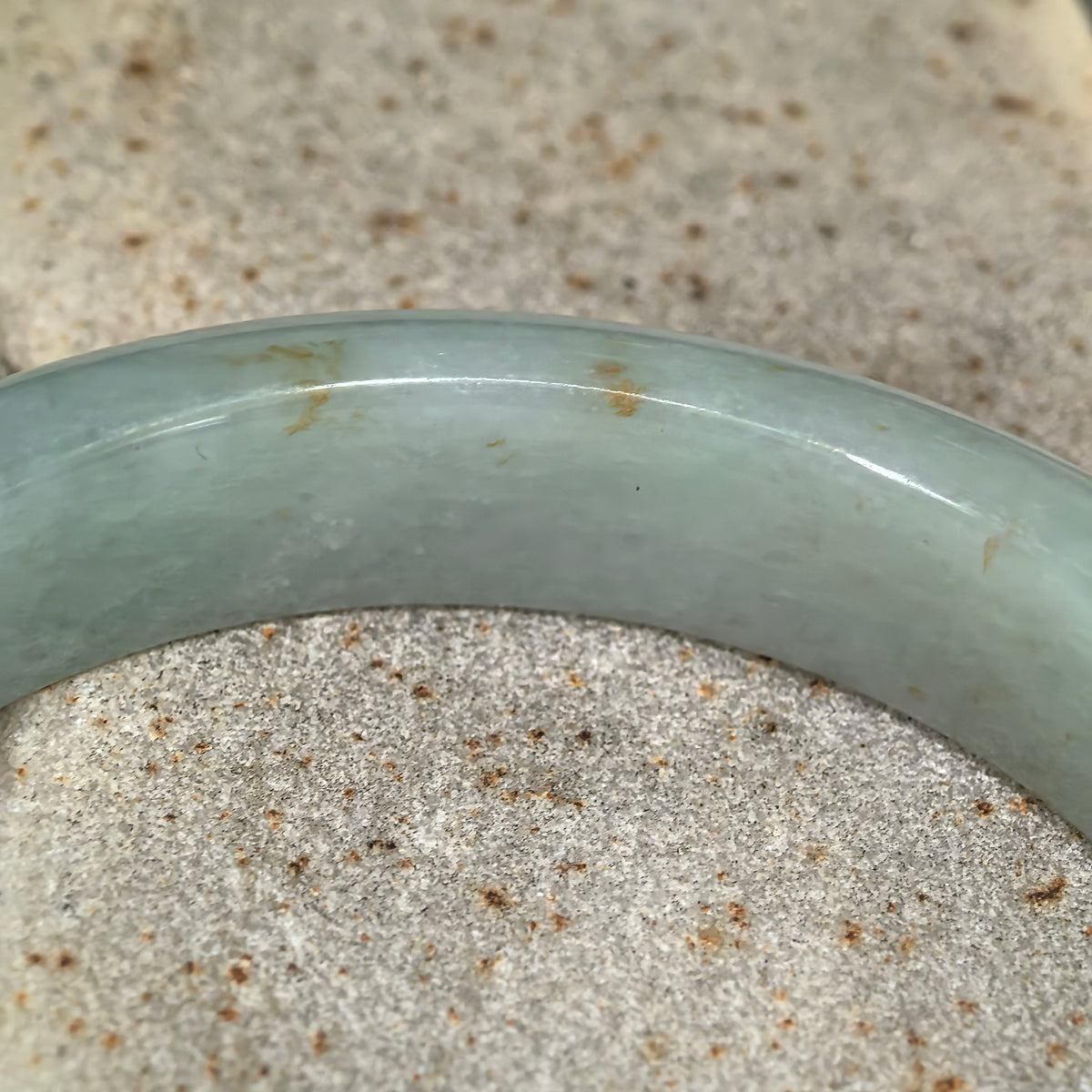 Glutinous Pale Apple Green D-Shape Jadeite Bangle with Golden-Brown Flecks -57mm