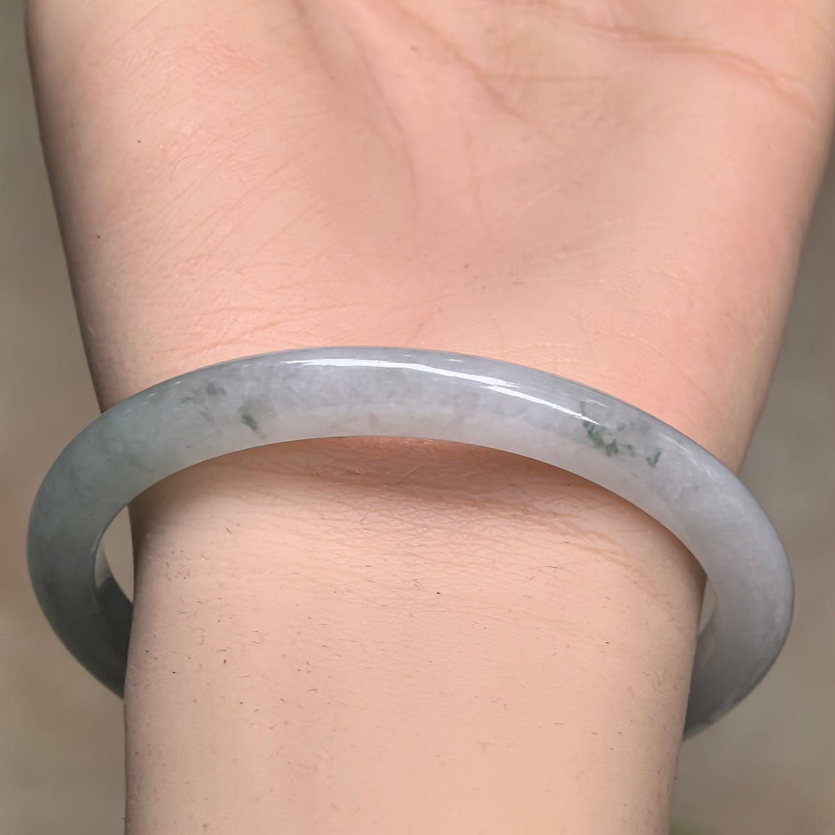 Icy Glutinous Pale Green Slim Oval Jadeite Bangle with a Green Section -53mm