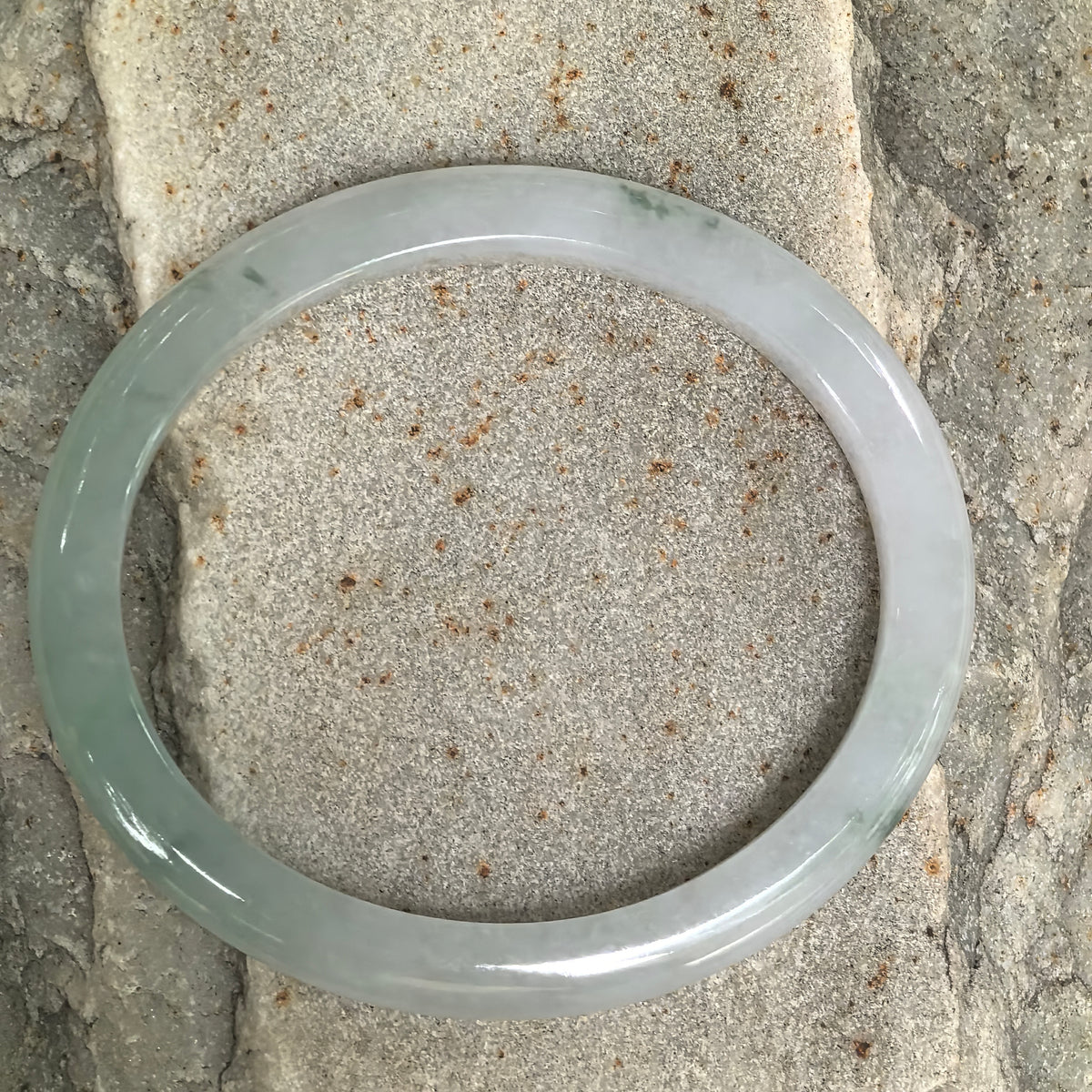 Icy Glutinous Pale Green Slim Oval Jadeite Bangle with a Green Section -53mm