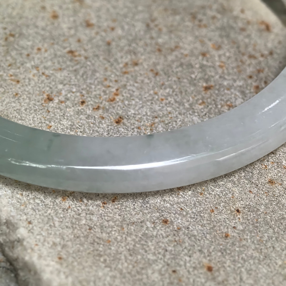 Icy Glutinous Pale Green Slim Oval Jadeite Bangle with a Green Section -53mm