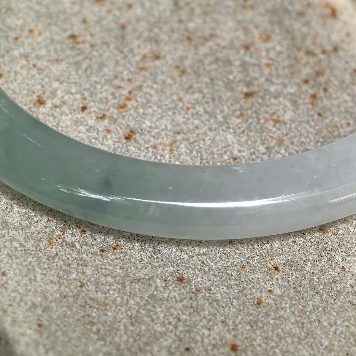 Icy Glutinous Pale Green Slim Oval Jadeite Bangle with a Green Section -53mm