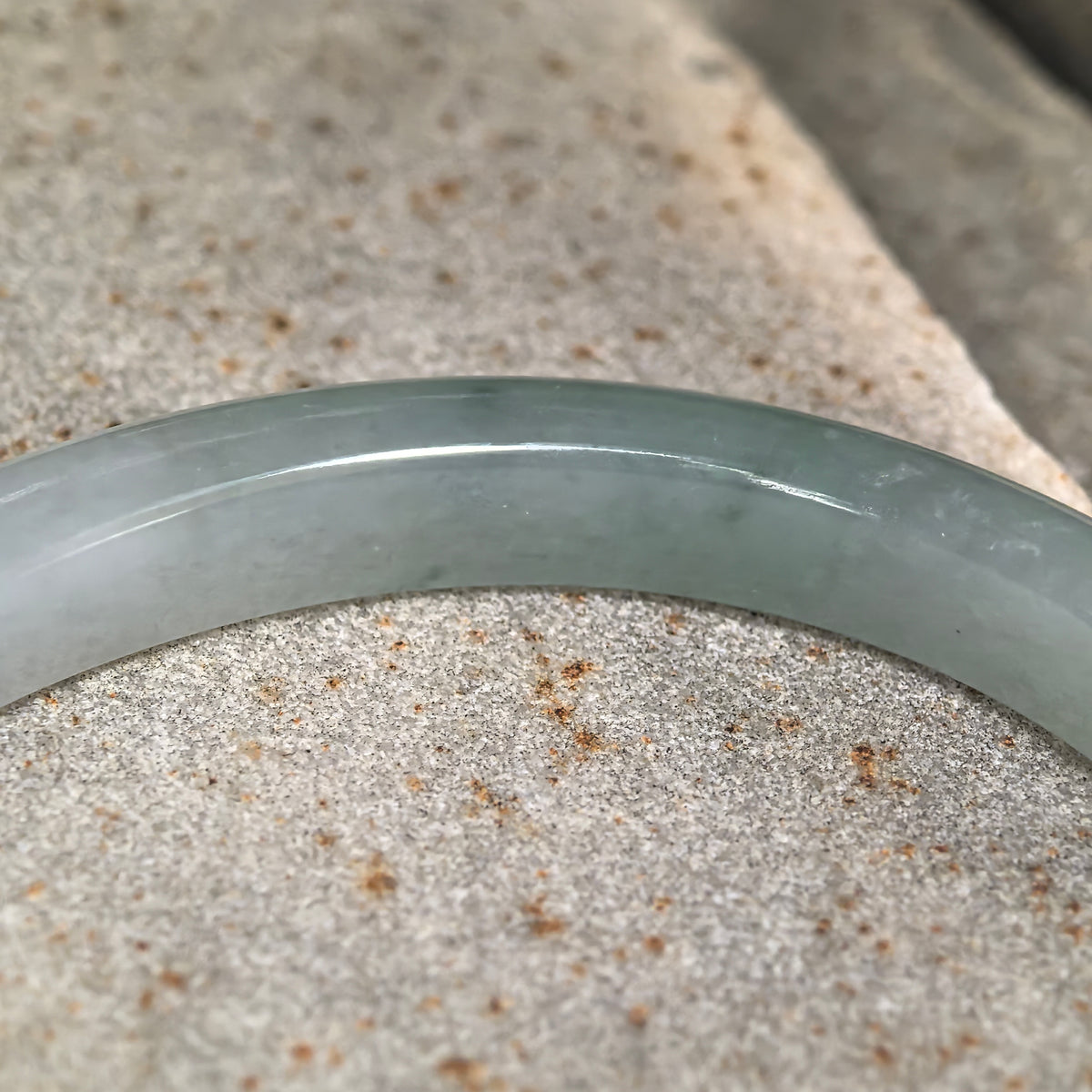 Icy Glutinous Pale Green Slim Oval Jadeite Bangle with a Green Section -53mm