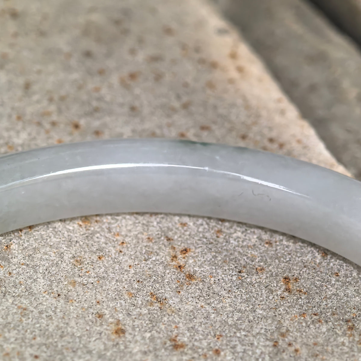 Icy Glutinous Pale Green Slim Oval Jadeite Bangle with a Green Section -53mm