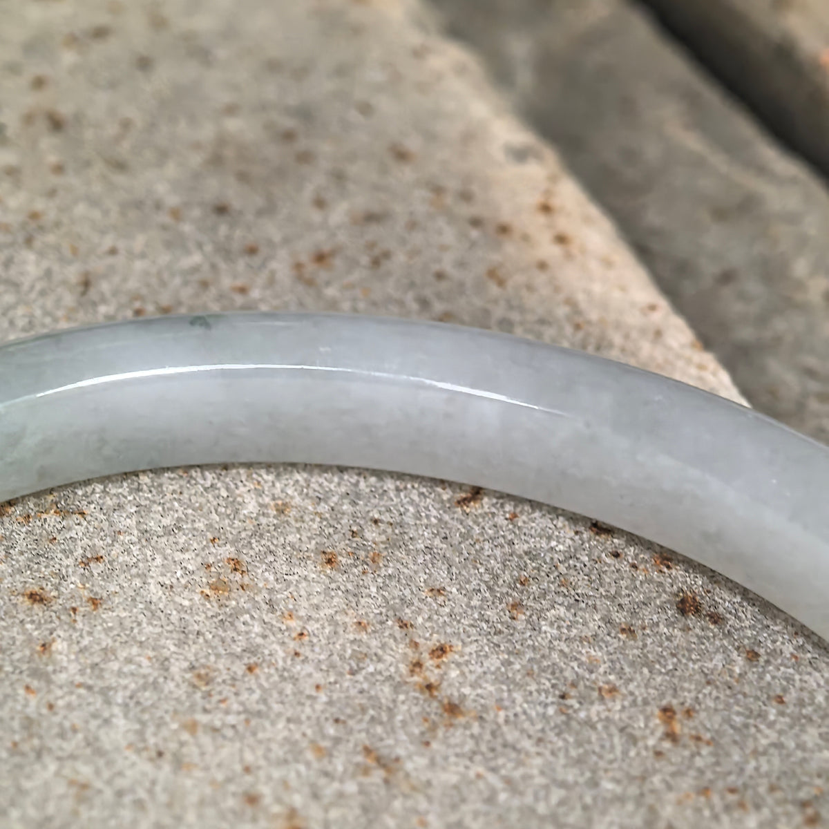 Icy Glutinous Pale Green Slim Oval Jadeite Bangle with a Green Section -53mm