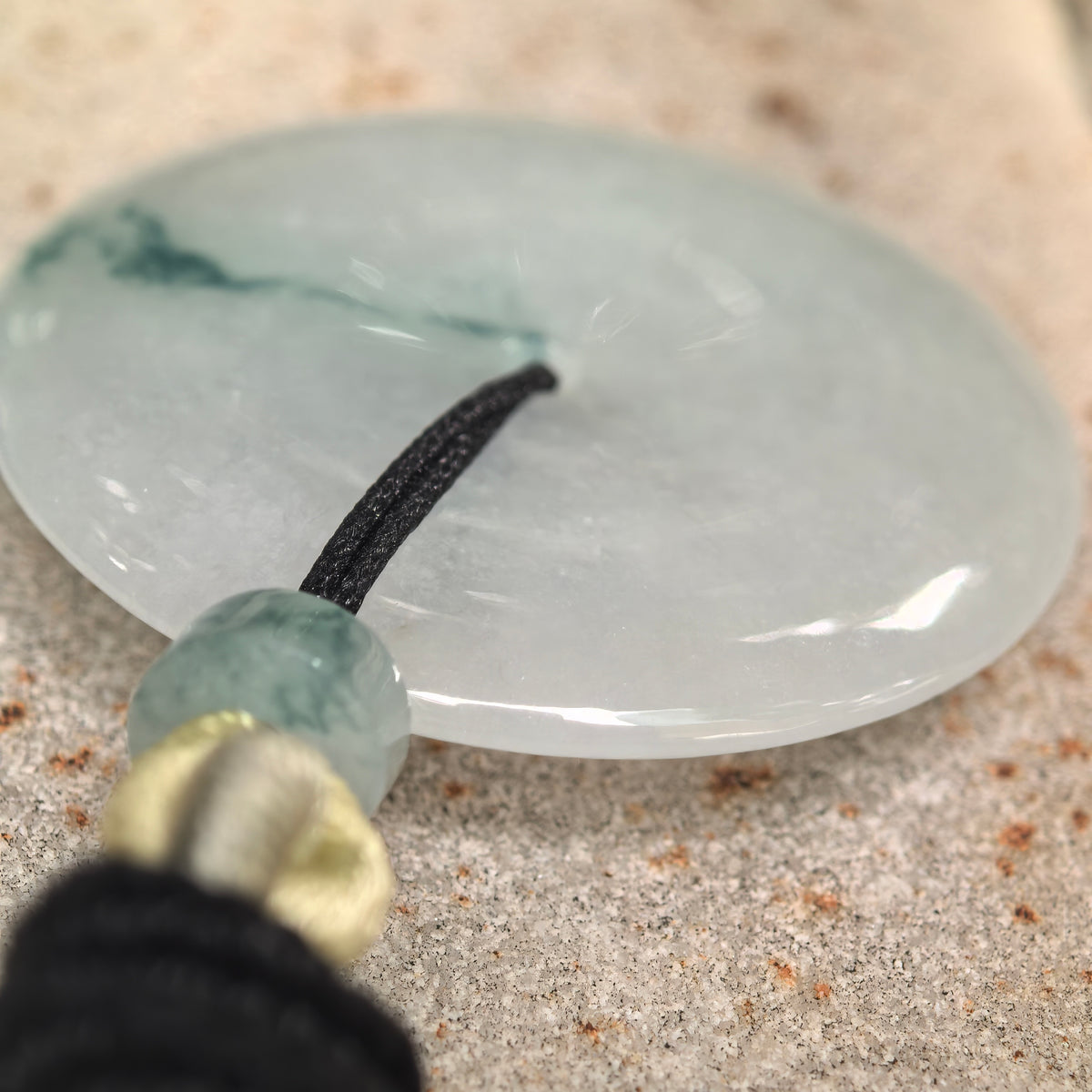 Glutinous Pale Green Jadeite Peace Pendant with Deep Green Floating Pattern