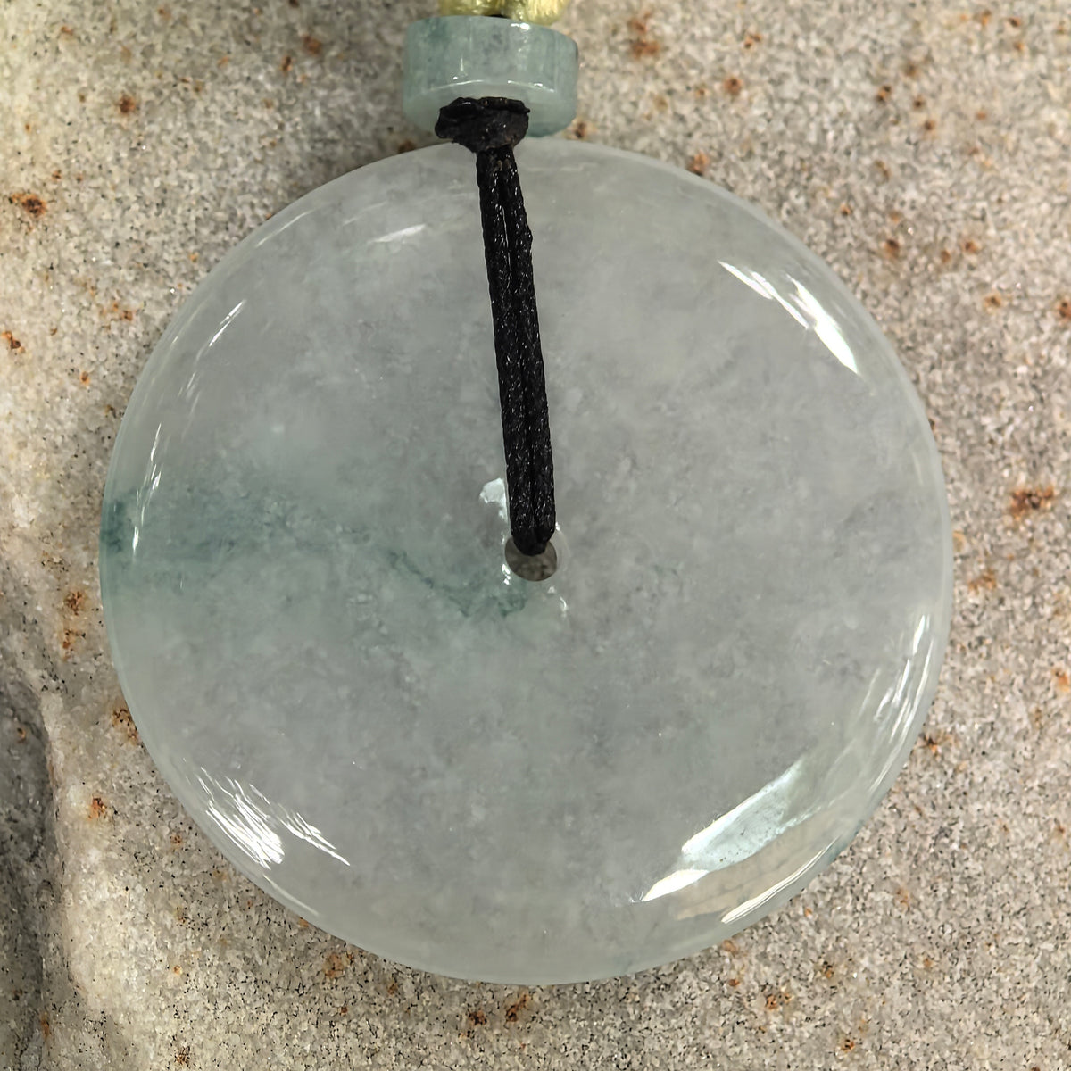 Glutinous Pale Green Jadeite Peace Pendant with Deep Green Floating Pattern
