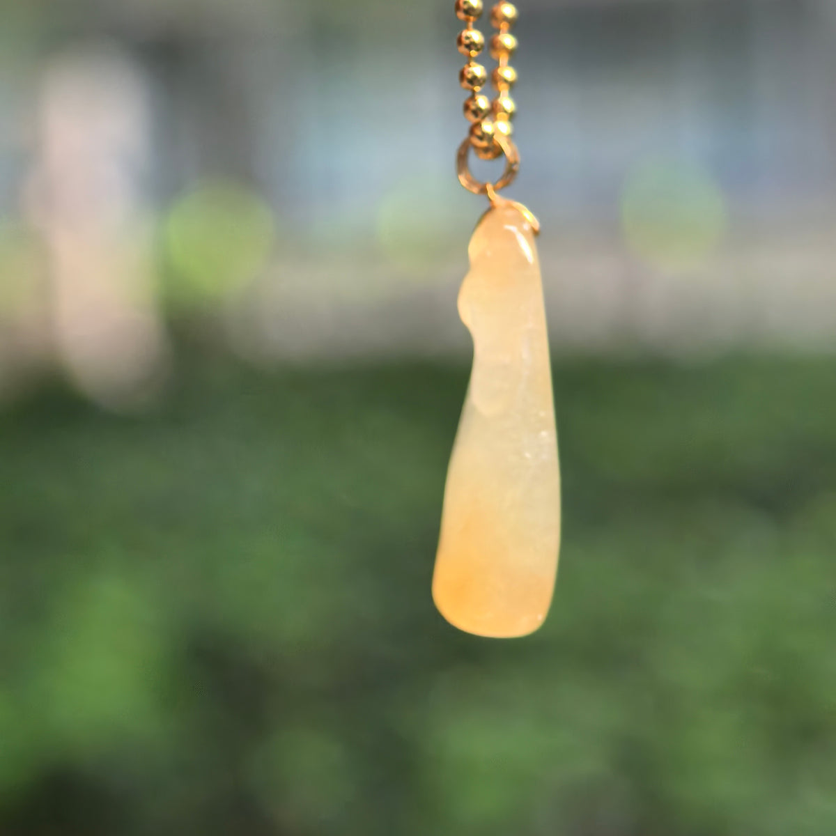 Icy Glutinous Yellow Horse Head Jadeite Pendant