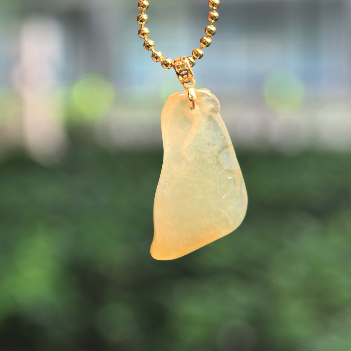 Icy Glutinous Yellow Horse Head Jadeite Pendant