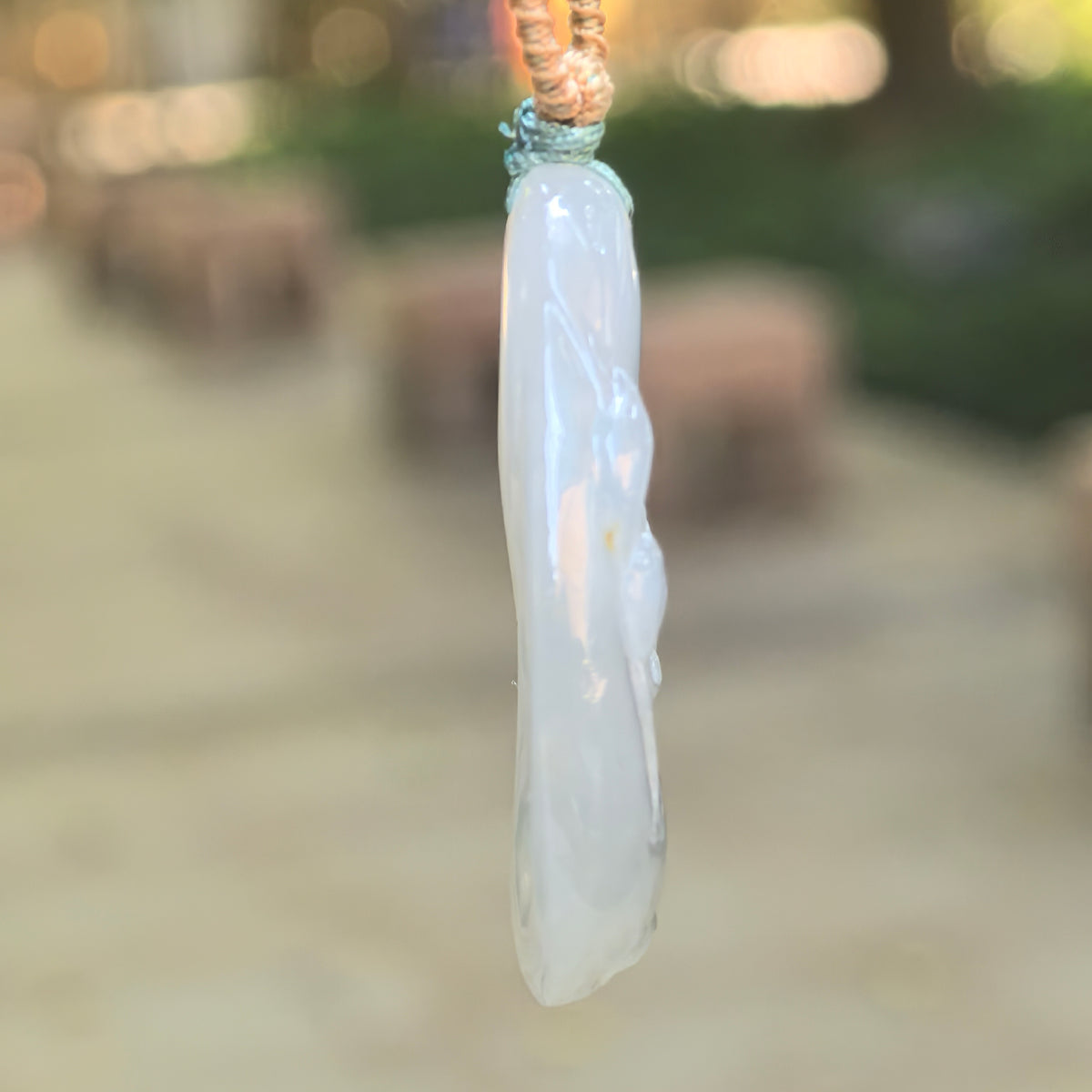 Glutinous White Jadeite Lotus and Fish Pendant with a Blue Undertone