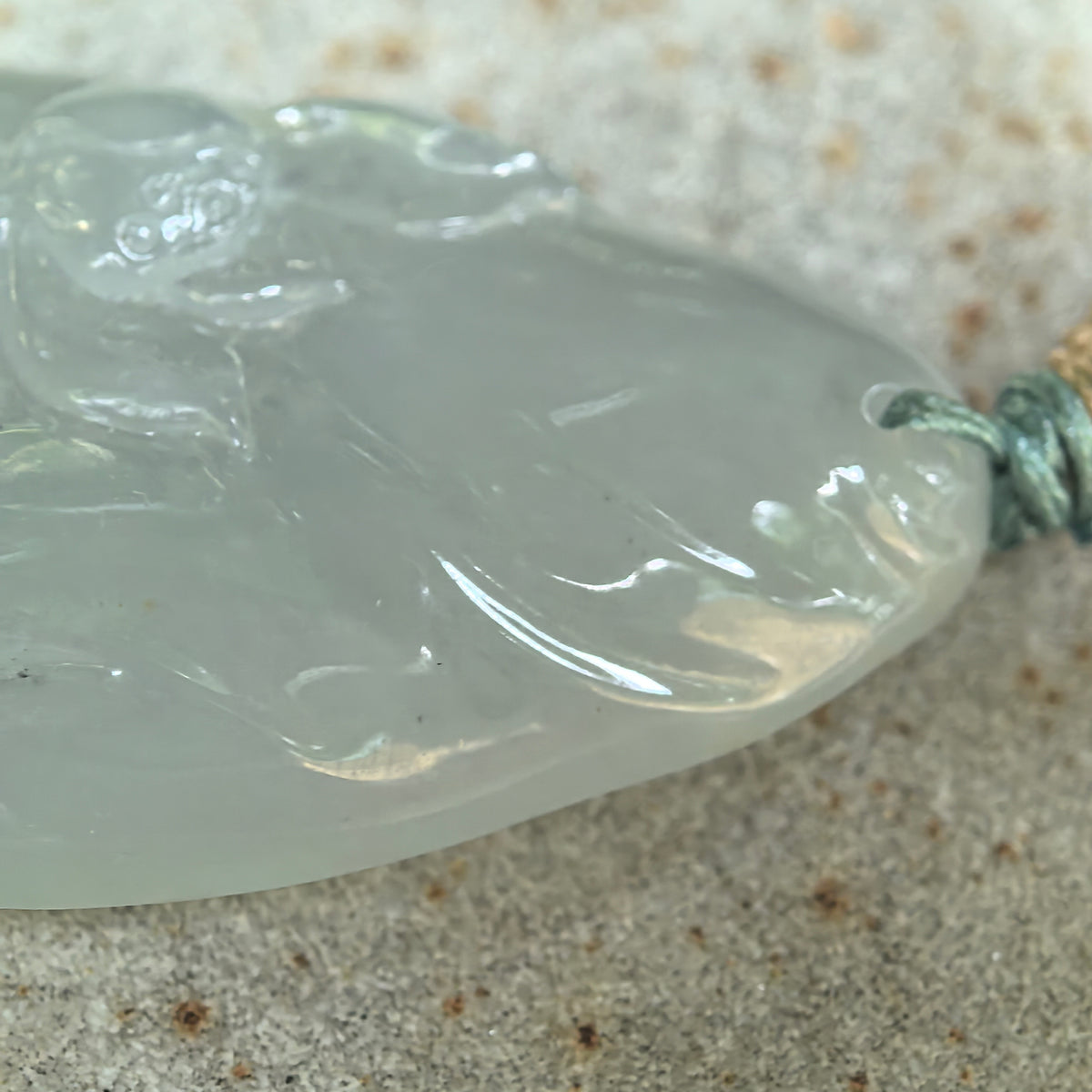 Glutinous White Jadeite Lotus and Fish Pendant with a Blue Undertone